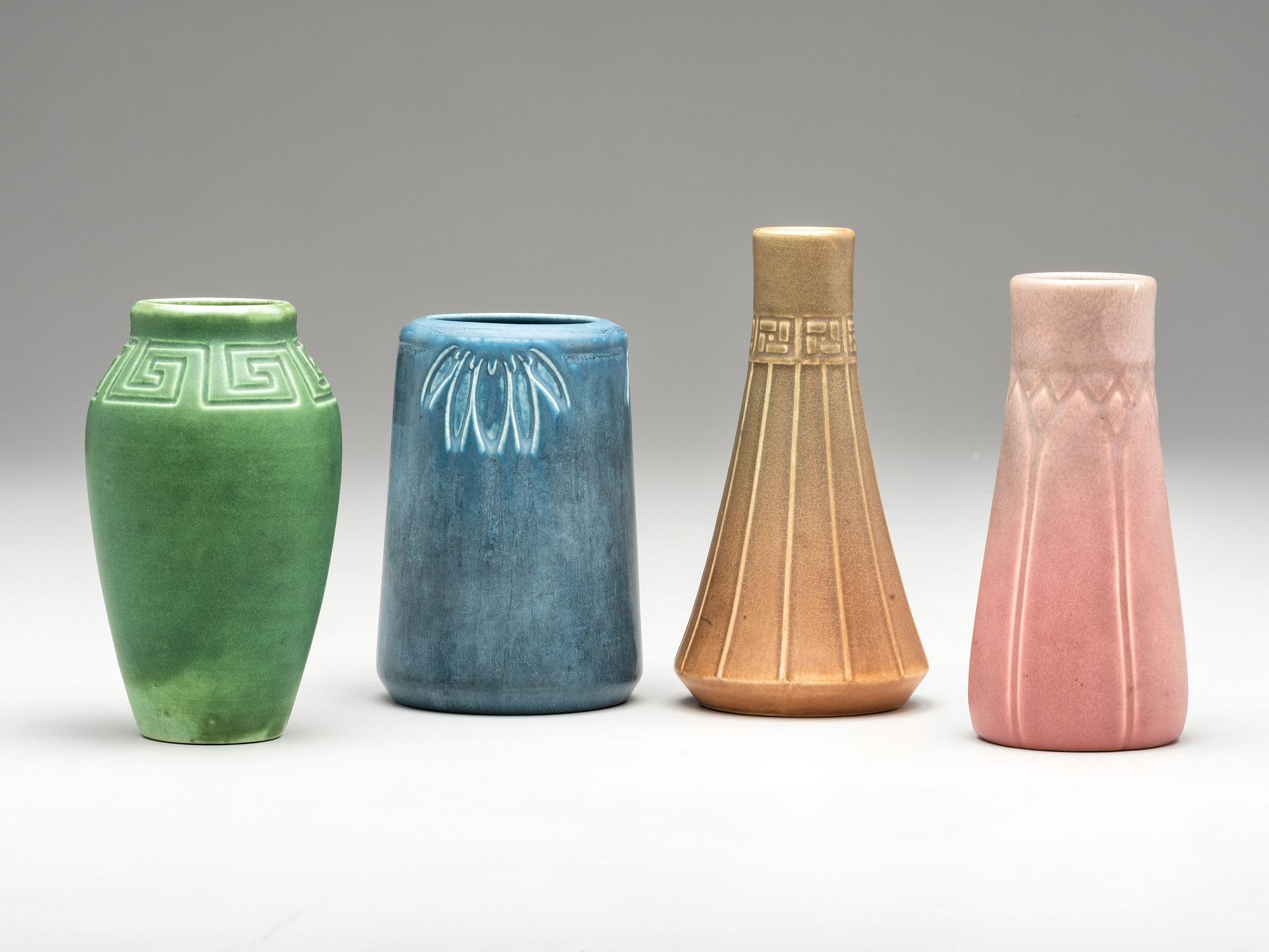 Four Carved and Mat Vases