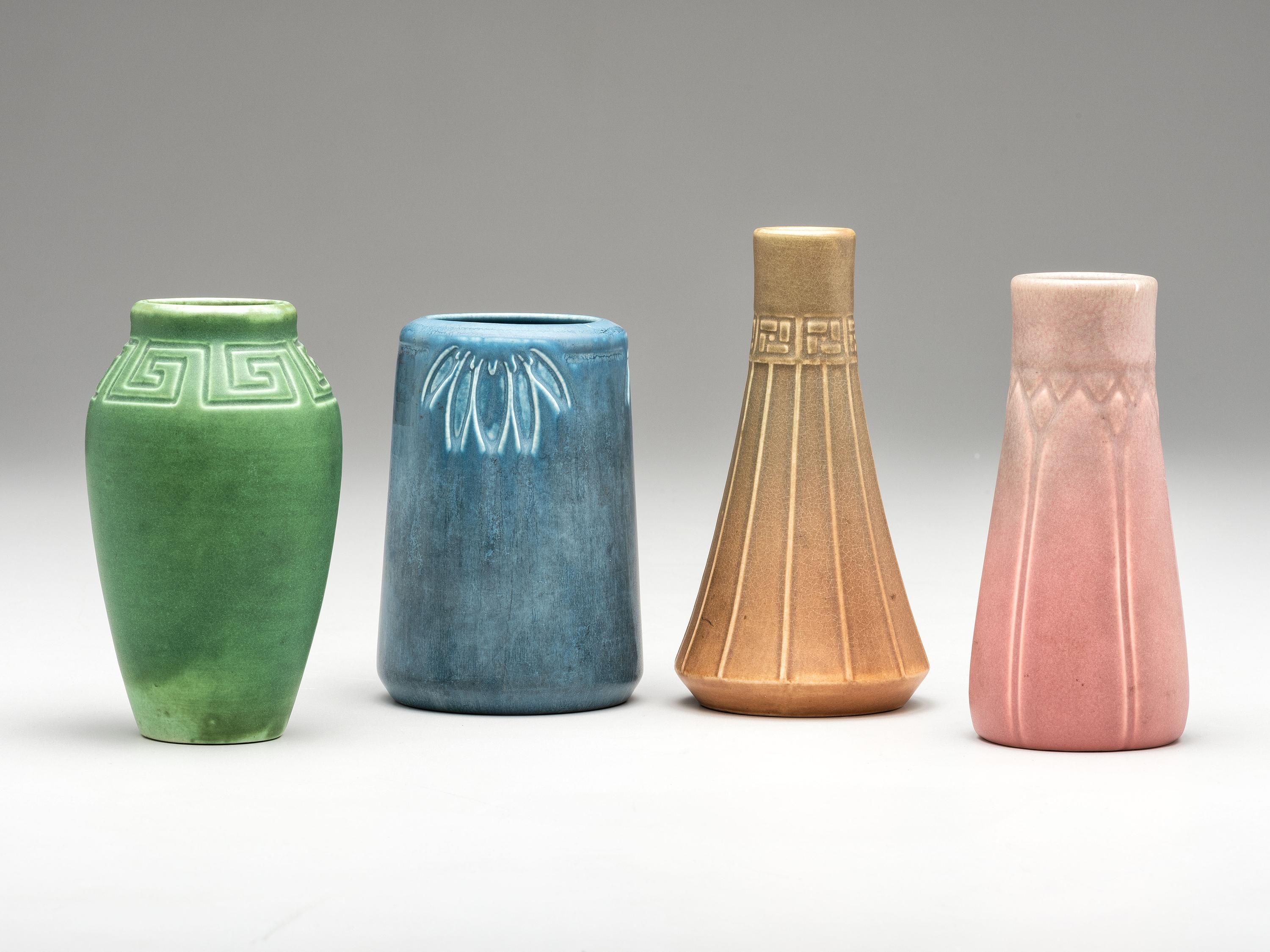 Four Carved and Mat Vases