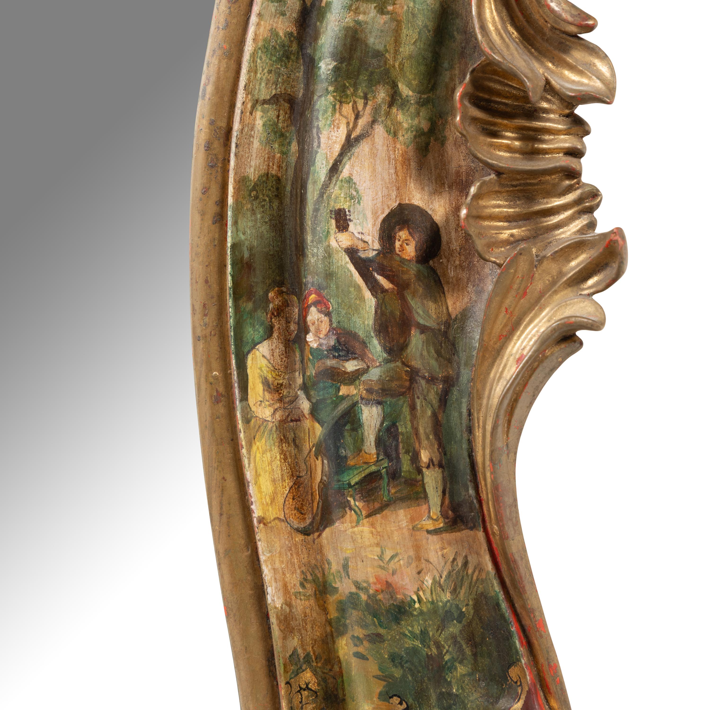 A Venetian Rococo Style Polychrome Painted and Parcel Gilt Mirror