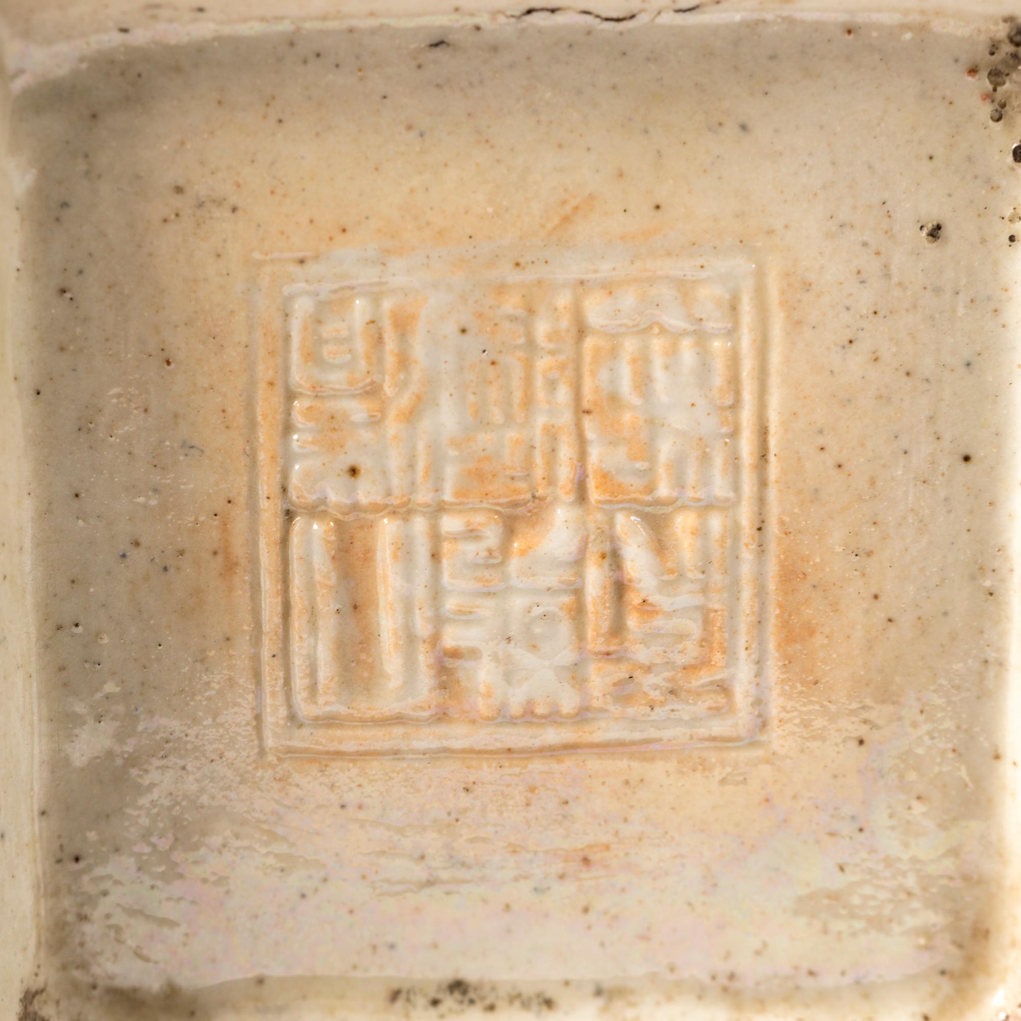 A Chinese Carved Sancai Porcelain Vase