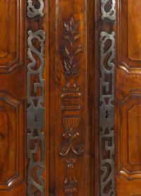 A Louis XV Provincial Carved Walnut Armoire