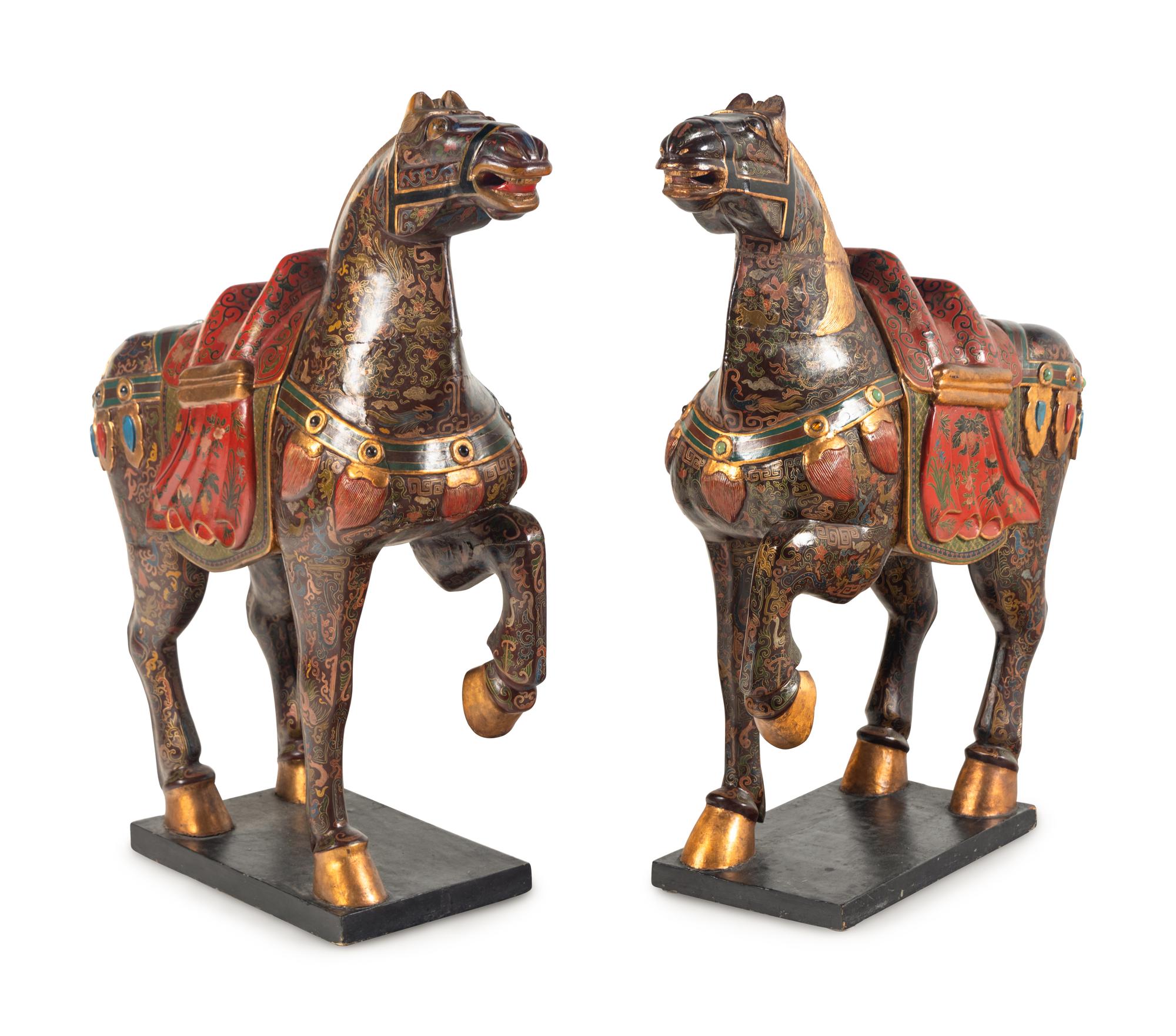 A Pair of Chinese Painted and Parcel Gilt Horses