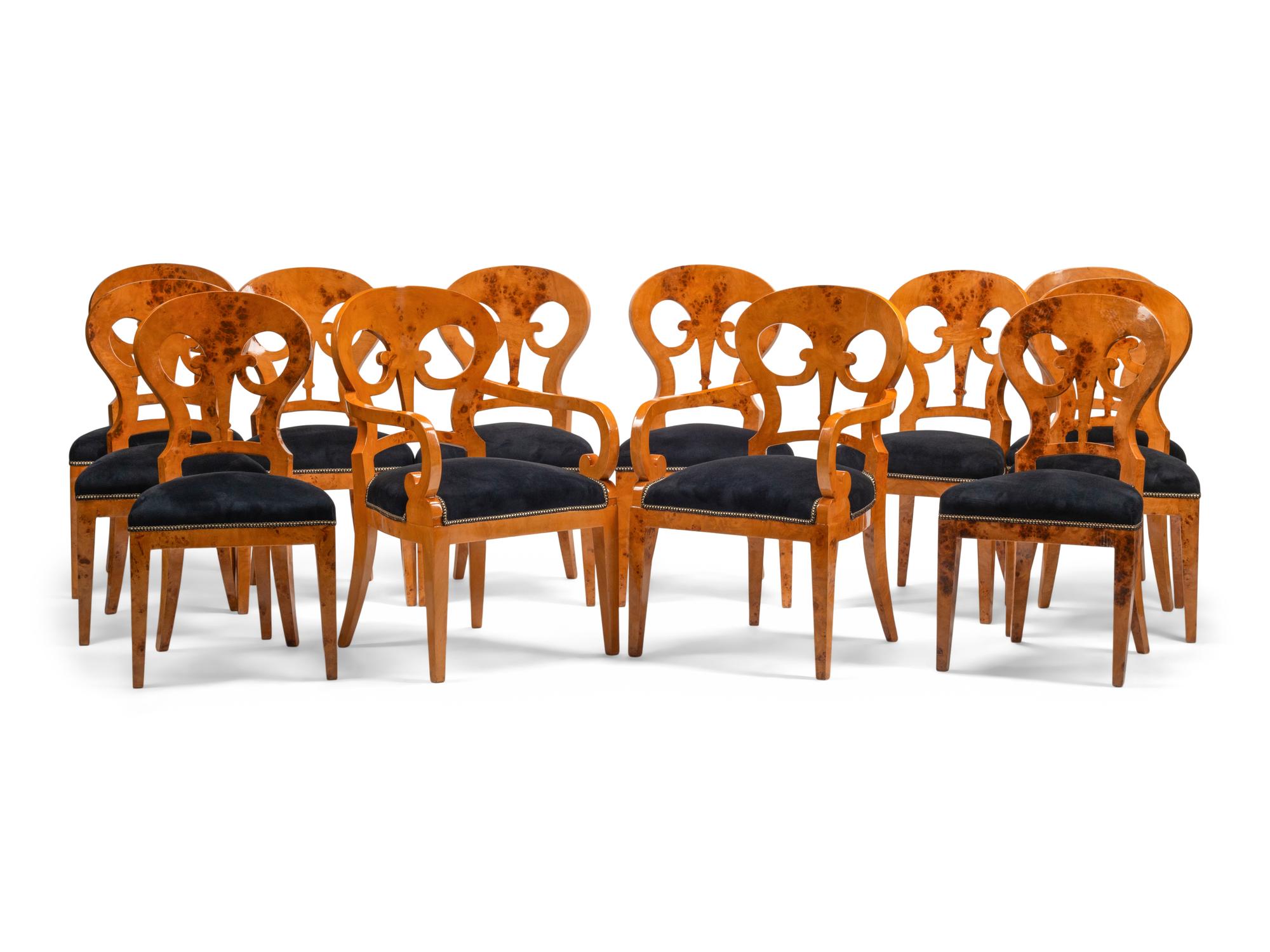 A Set of Twelve Biedermeier Style Burlwood Dining Chairs