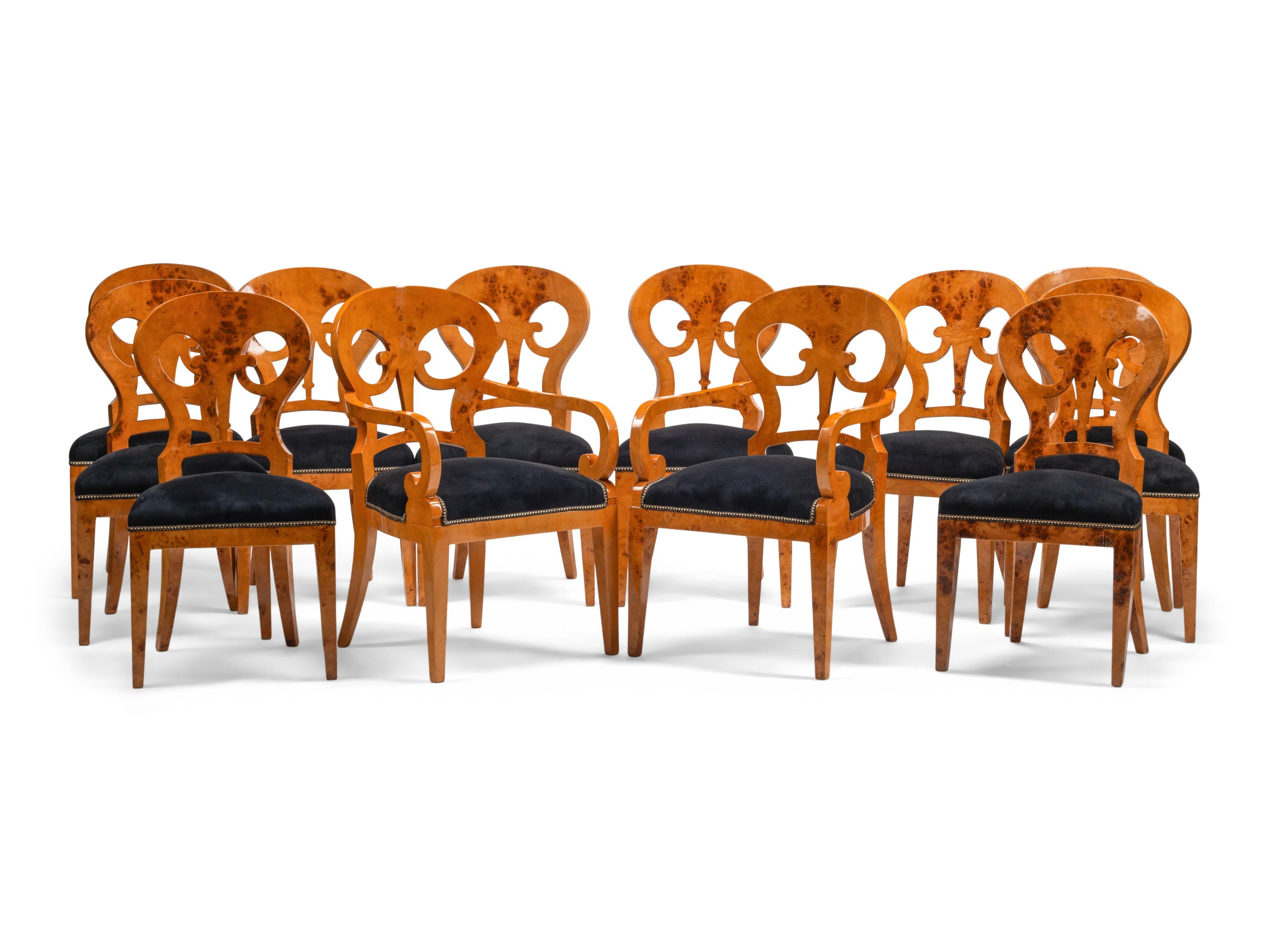 A Set of Twelve Biedermeier Style Burlwood Dining Chairs