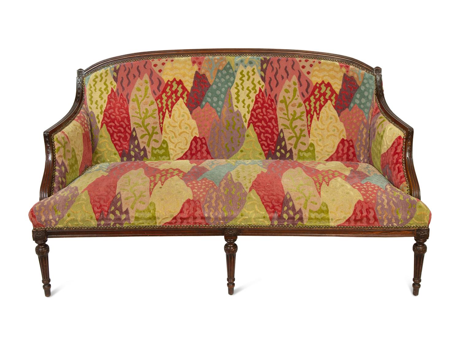 A Pair of Louis XVI Style Mahogany Settees