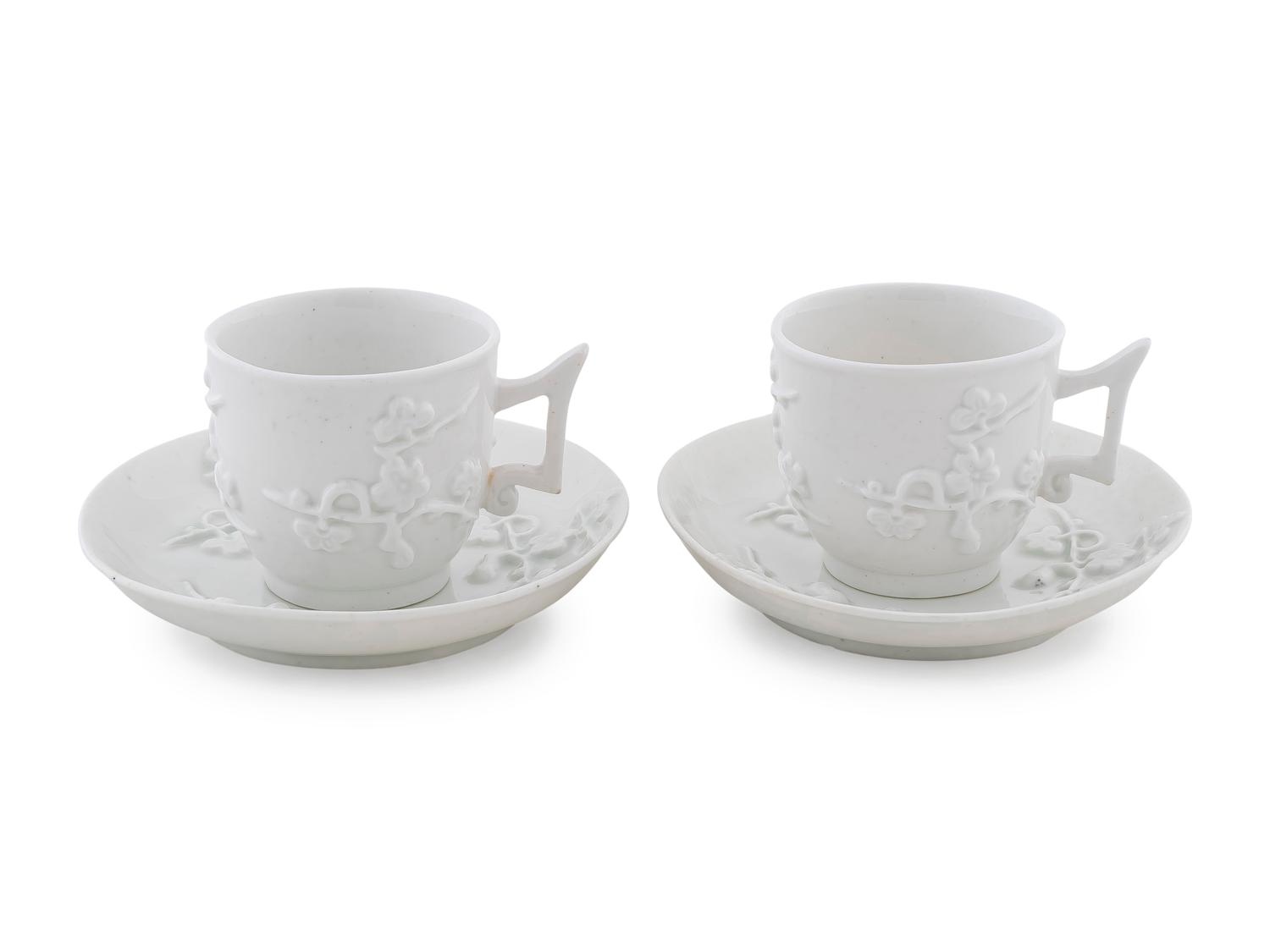 A Pair of Chelsea Blanc de Chine Porcelain Cup and Saucers — C. 1760
