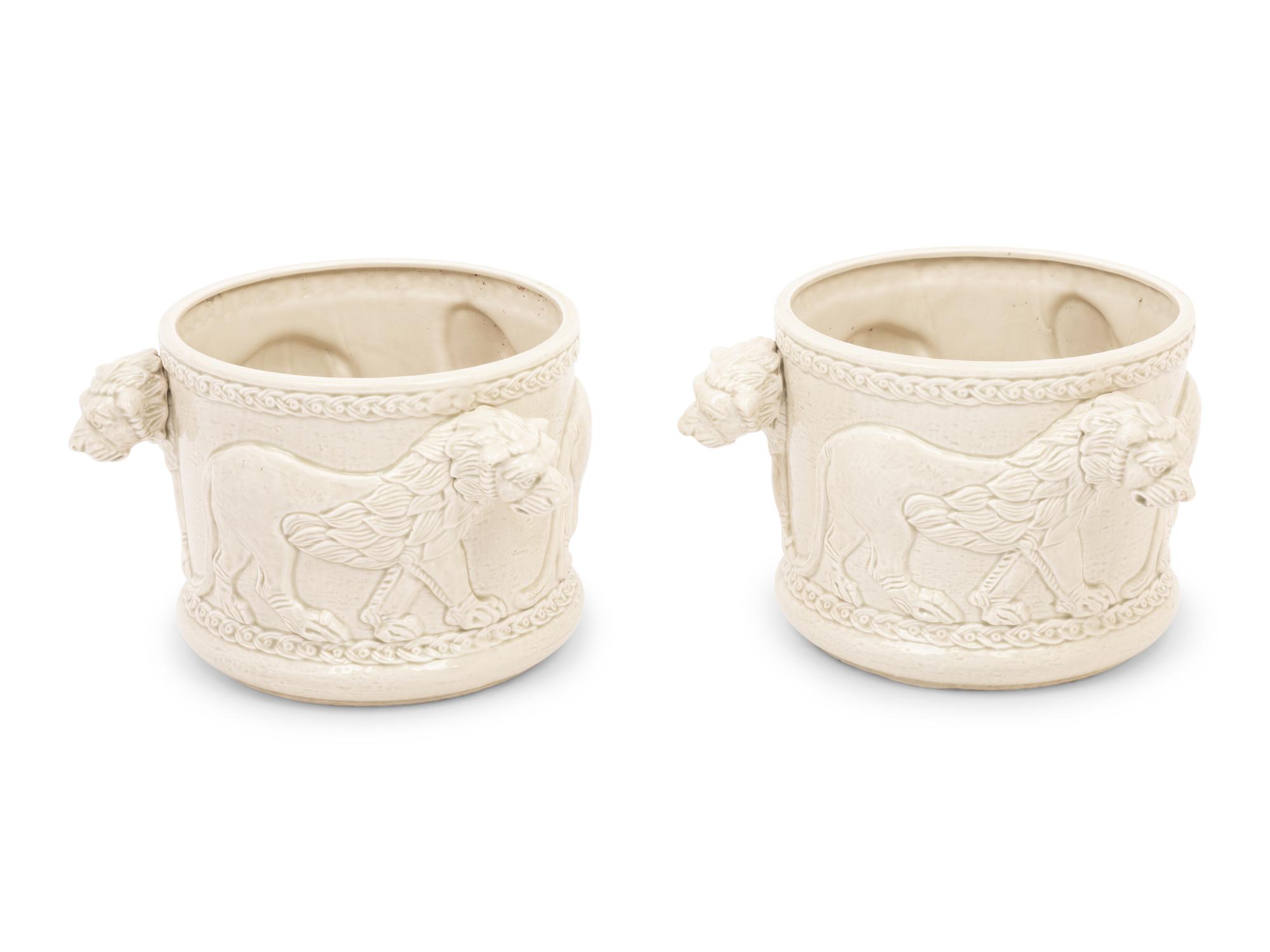 A Pair of Fitz and Floyd Glazed Ceramic Jardinières Modeled with Lions