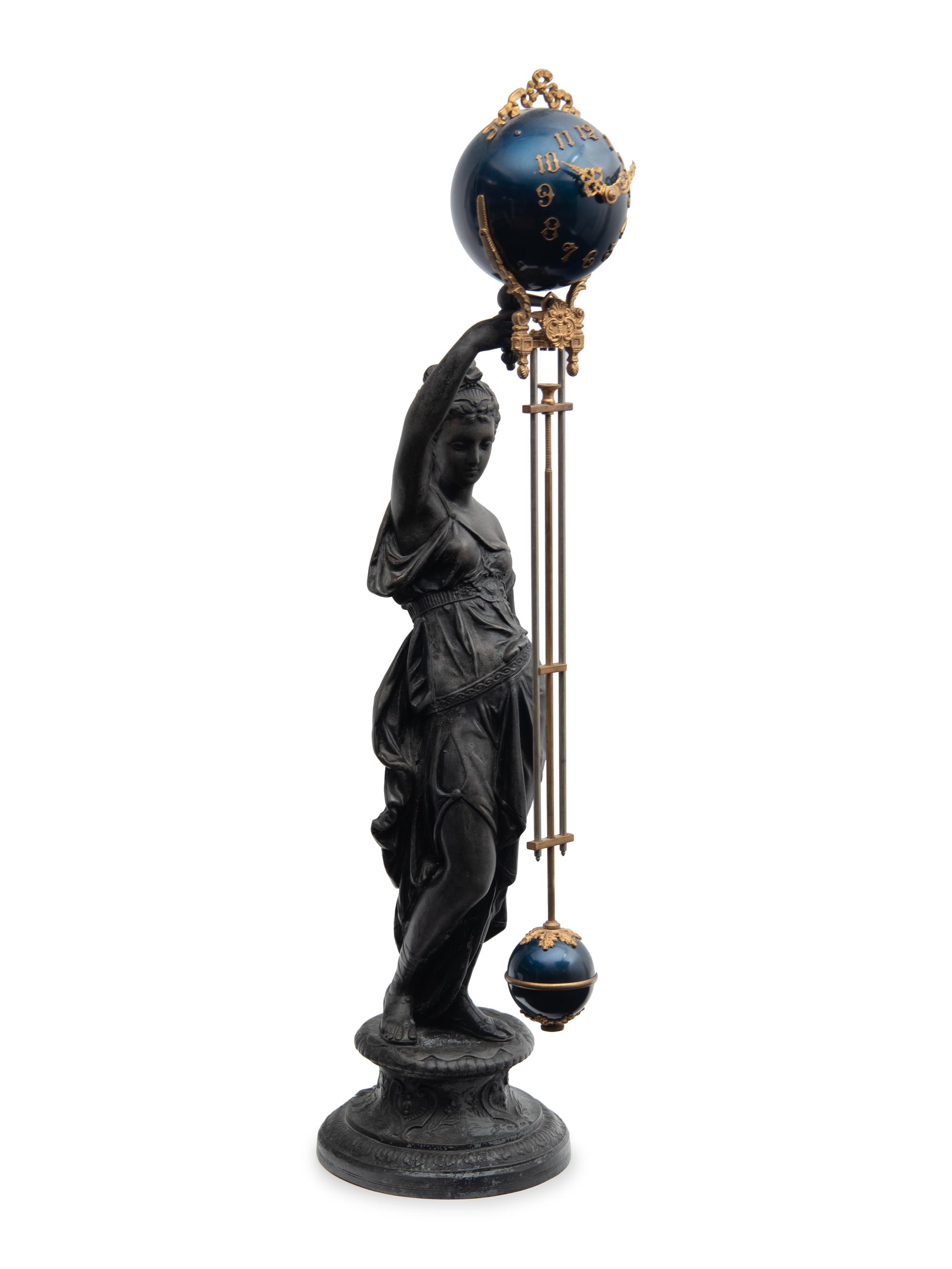 A Continental Cast Metal and Enameled Figural Pendulum Clock