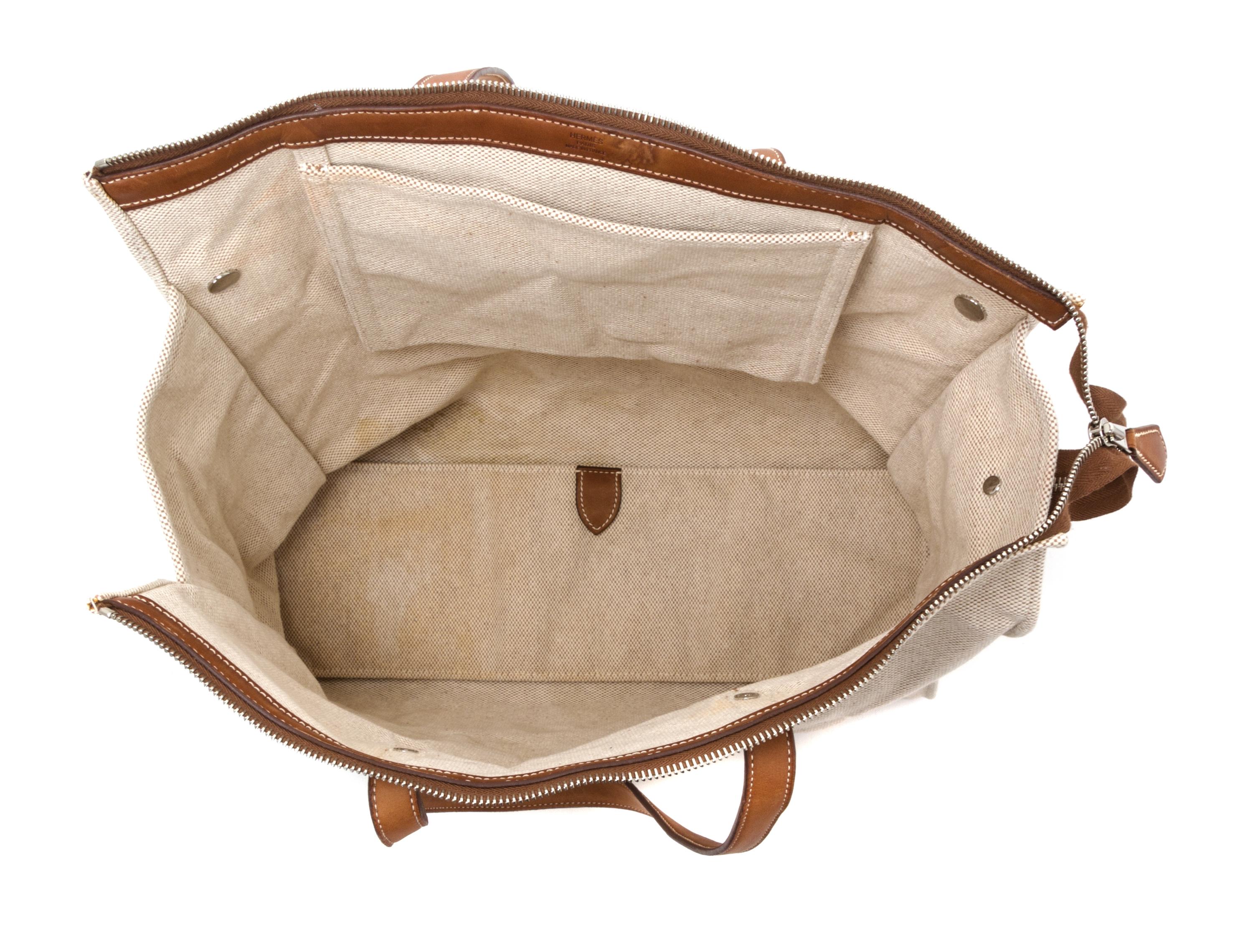 An Hermes Ecru Toile and Veau Barenia Mira Tote Bag, 14" x 14" x 5.5".