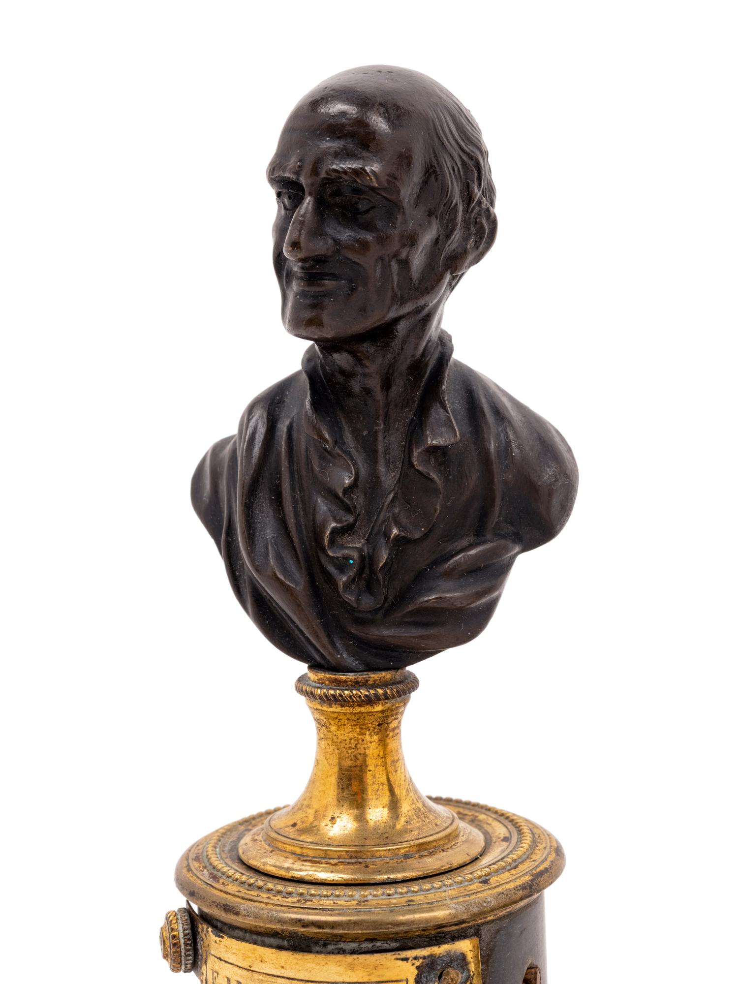 A Pair of French Bronze and Marble Small Busts of Voltaire and Rousseau