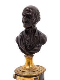 A Pair of French Bronze and Marble Small Busts of Voltaire and Rousseau