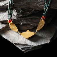 Larry Vasquez (Aztec-Mayan-Mescalero Apache, b. 1947) — 18K and 22K Gold and Gem Grade Turquoise Three-strand Necklace