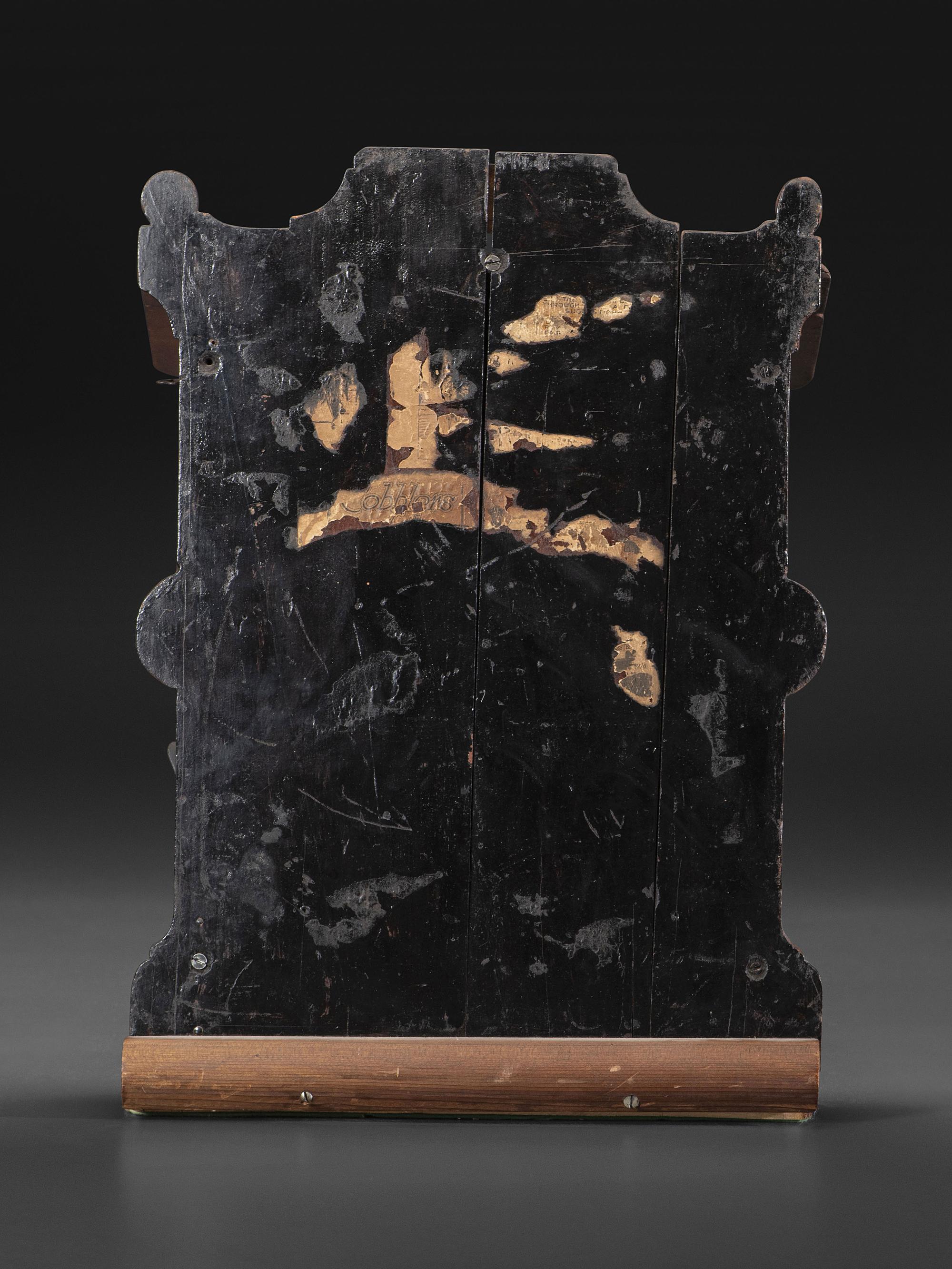 A Carved Wood Change Machine