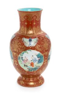 A Gilt Decorated Iron Red Ground Famille Rose Porcelain Vase Height 9 3/4 inches. — 18TH CENTURY