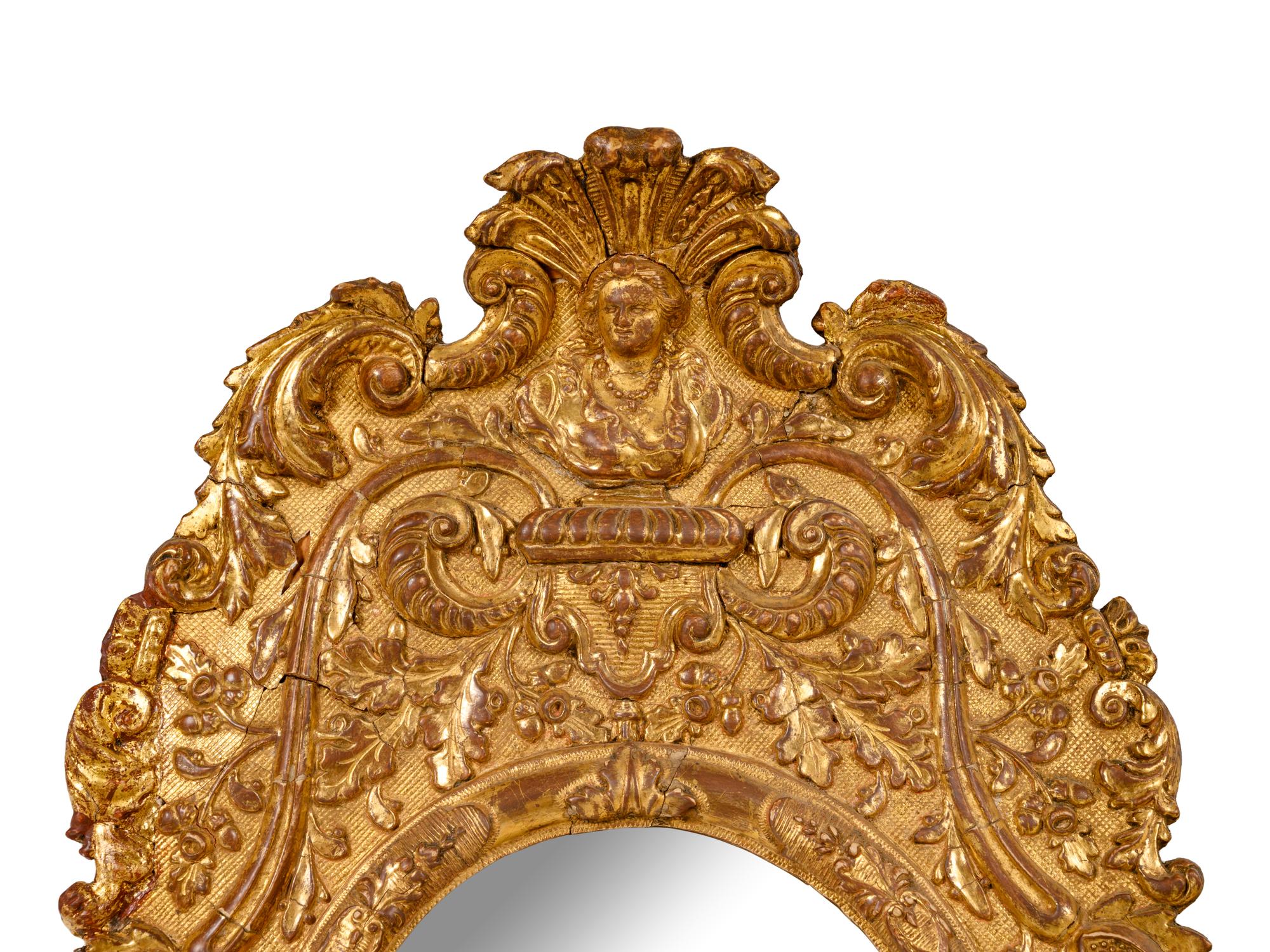 A Queen Anne Style Giltwood Mirror