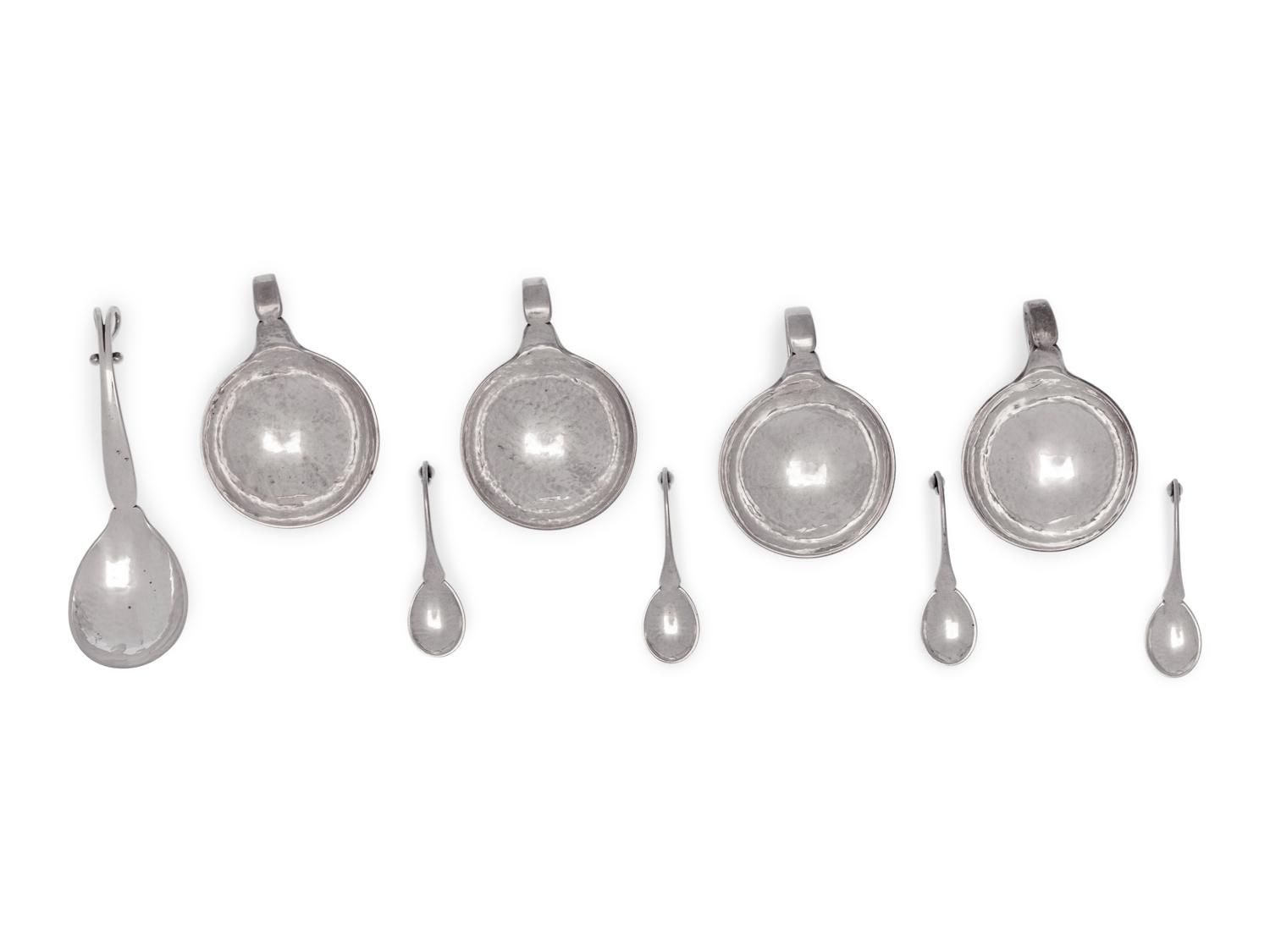 A Set of Four Georg Jensen Silver Salt Cellars and Spoons
