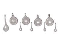 A Set of Four Georg Jensen Silver Salt Cellars and Spoons