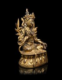 A Sino-Tibetan Gilt Bronze Figure of Green Tara