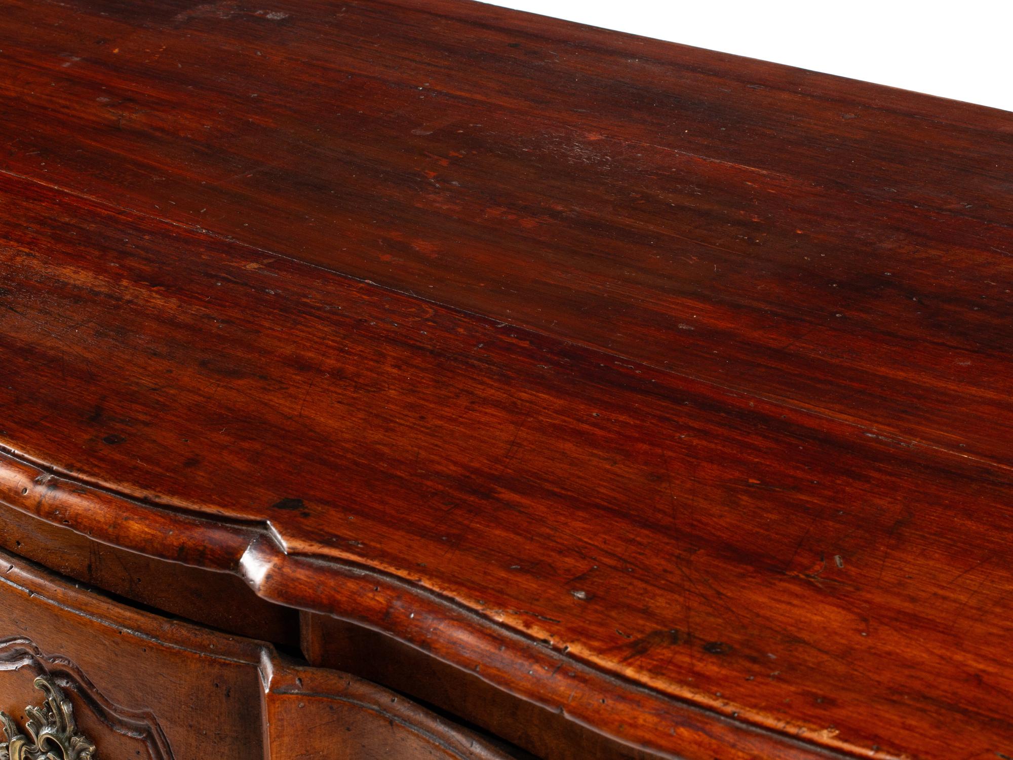 A Louis XV Provincial Walnut Commode