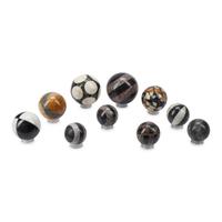 A Collection of Marble Spherical Ornaments