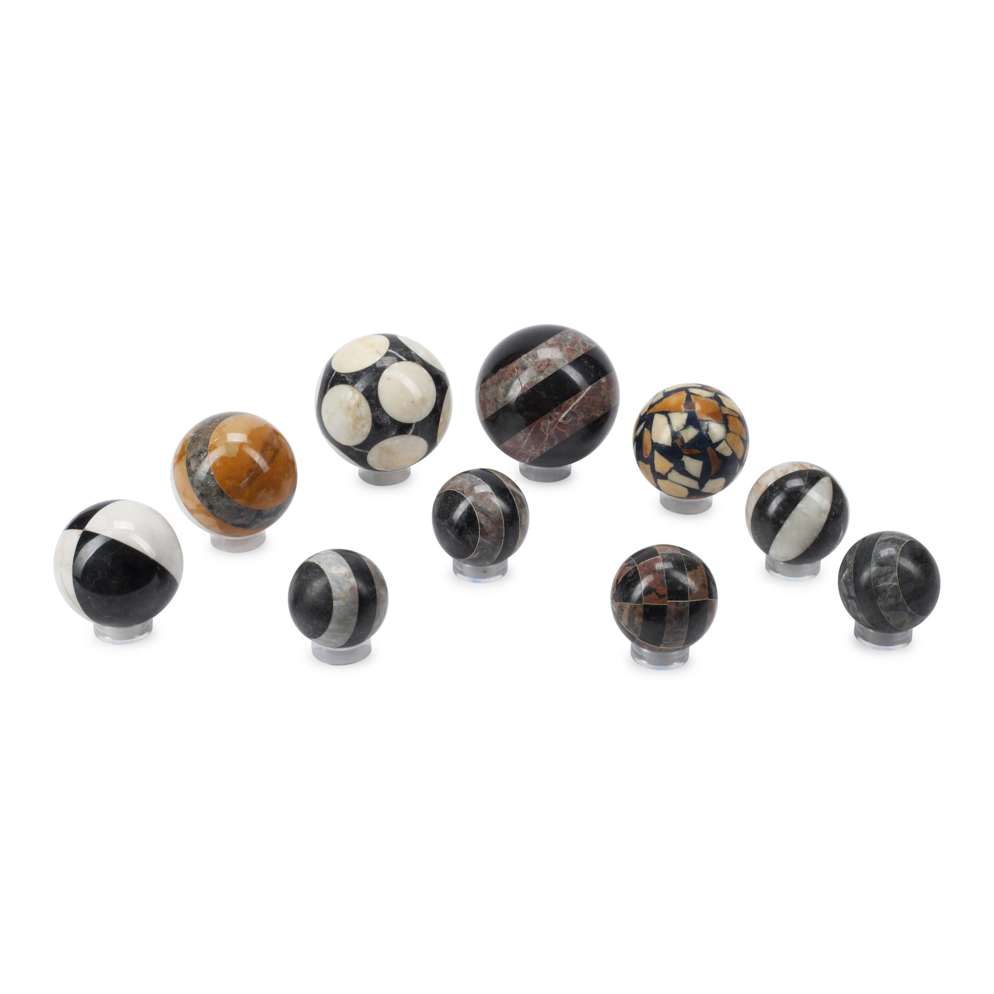 A Collection of Marble Spherical Ornaments