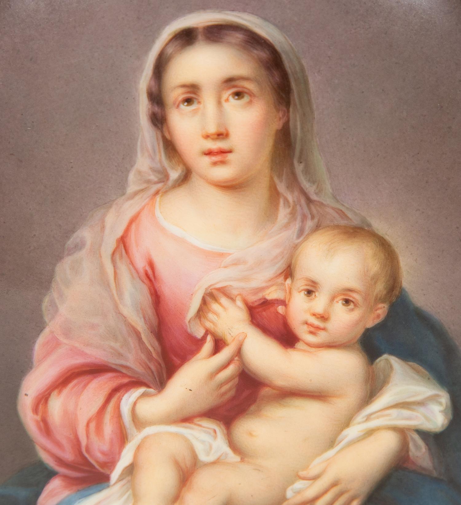 A Dresden Painted Porcelain Oval Plaque of the Madonna and Child