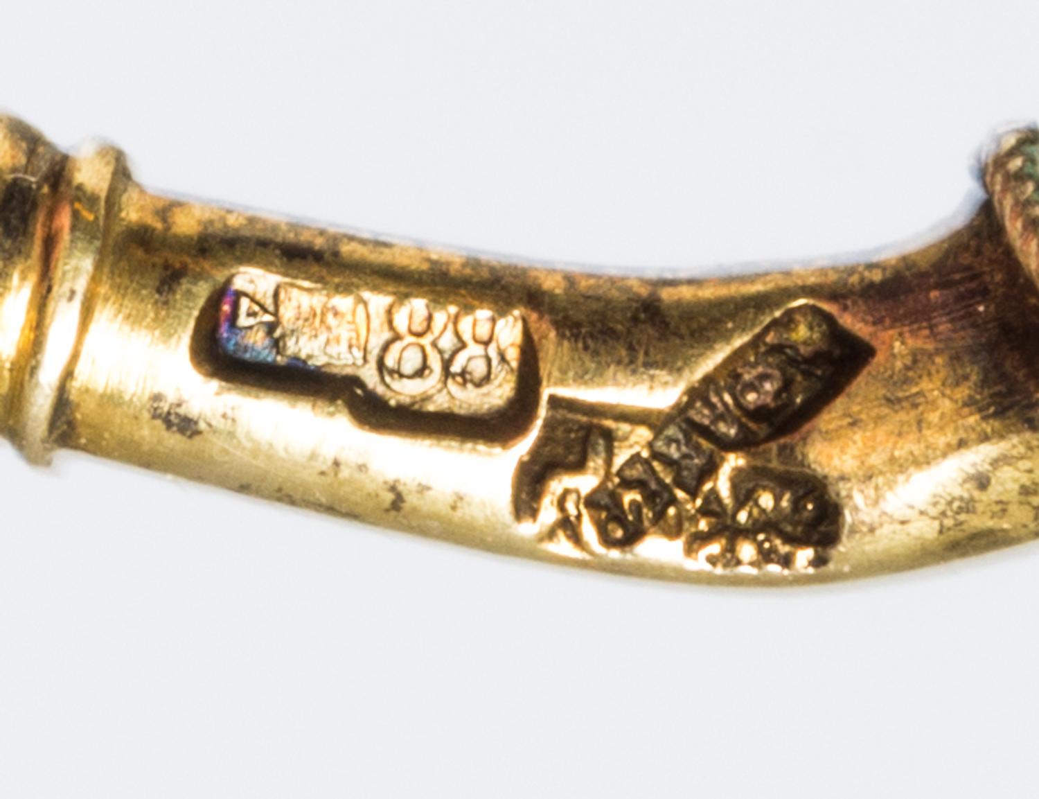A Set of Six Russian Silver-Gilt and Enamel Demitasse Spoons, Mark of K. Faberge with Imperial warrant, overstriking mark of Feodor Ruc