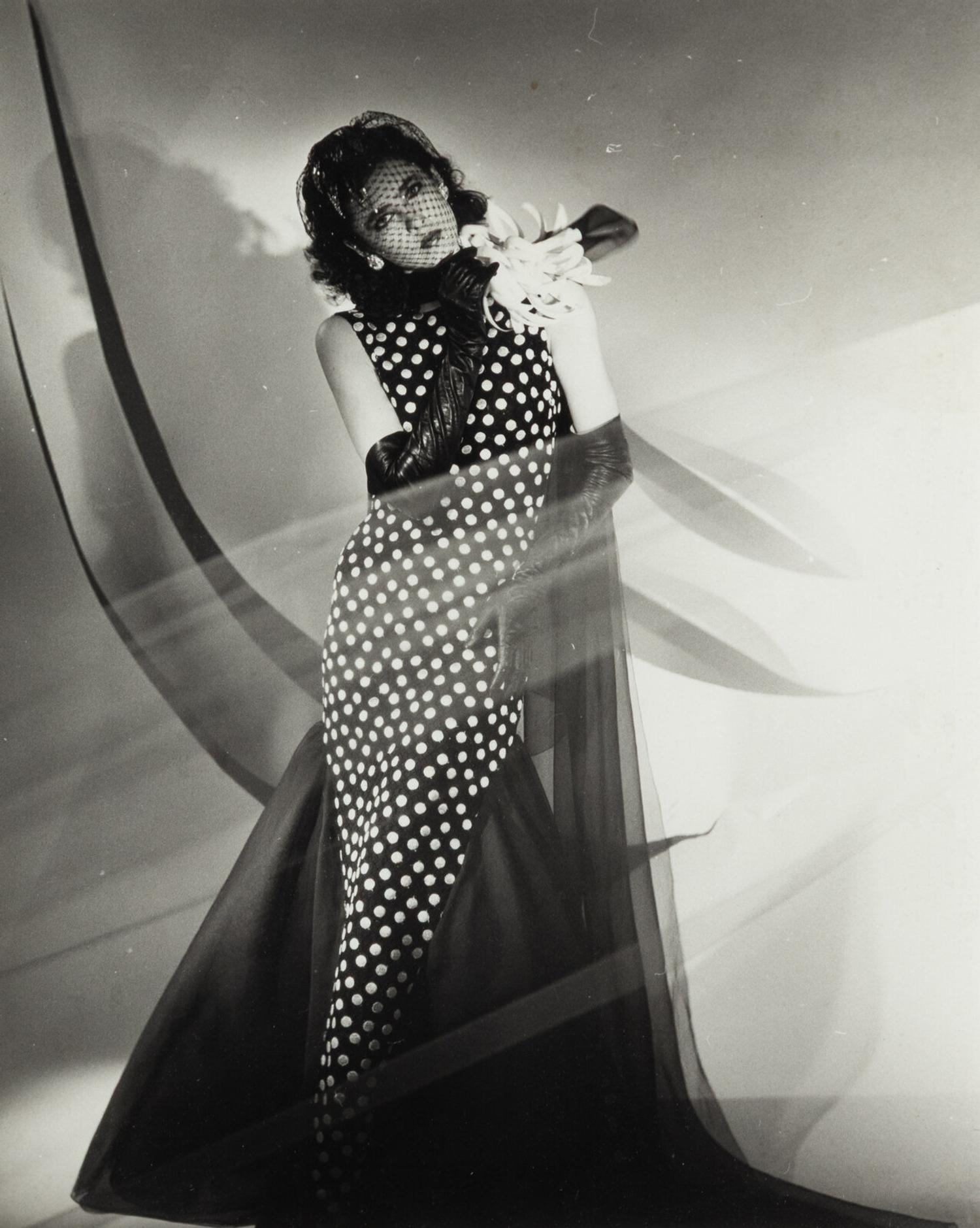Four photographs depicting Dayle Haddon
