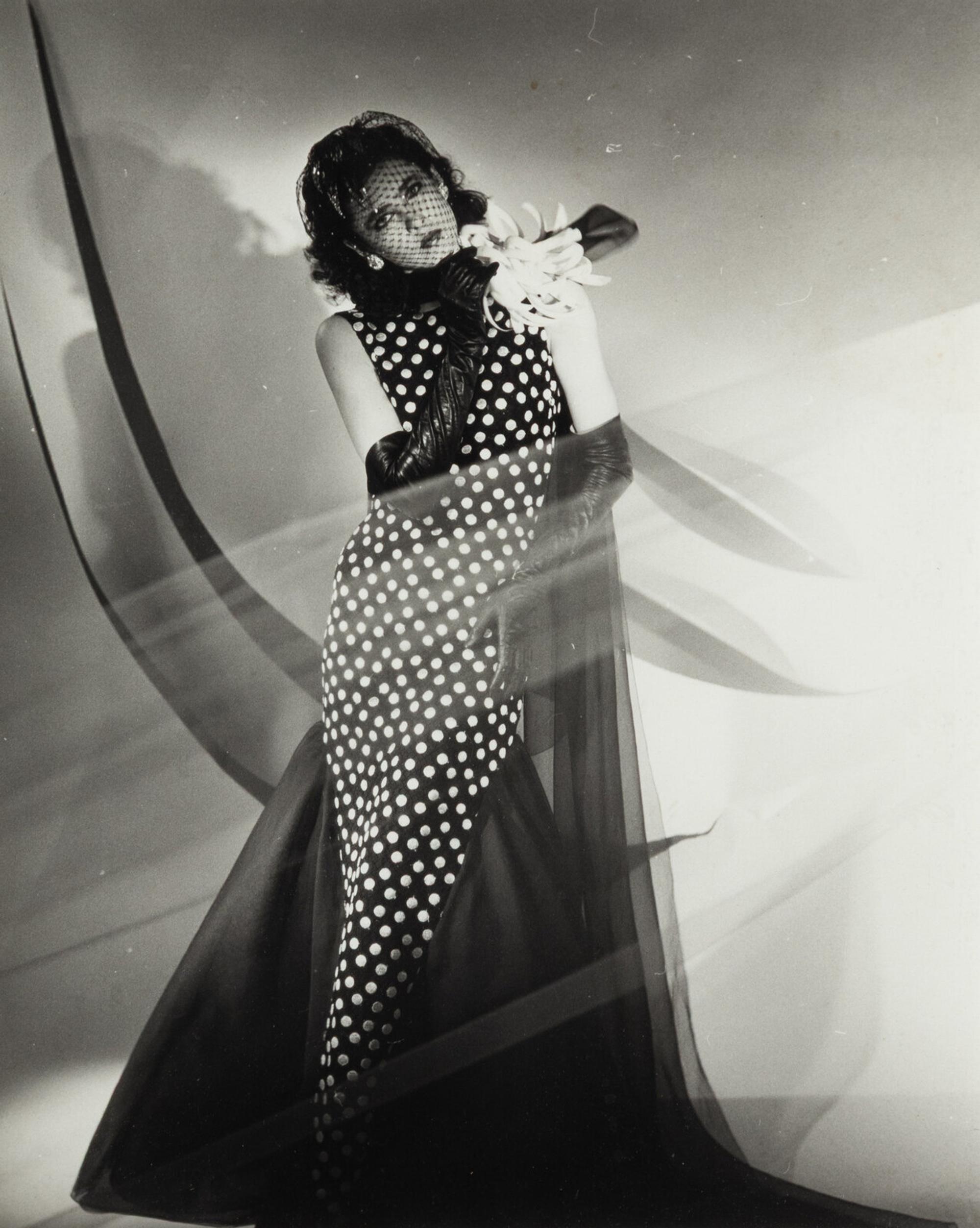 Four photographs depicting Dayle Haddon