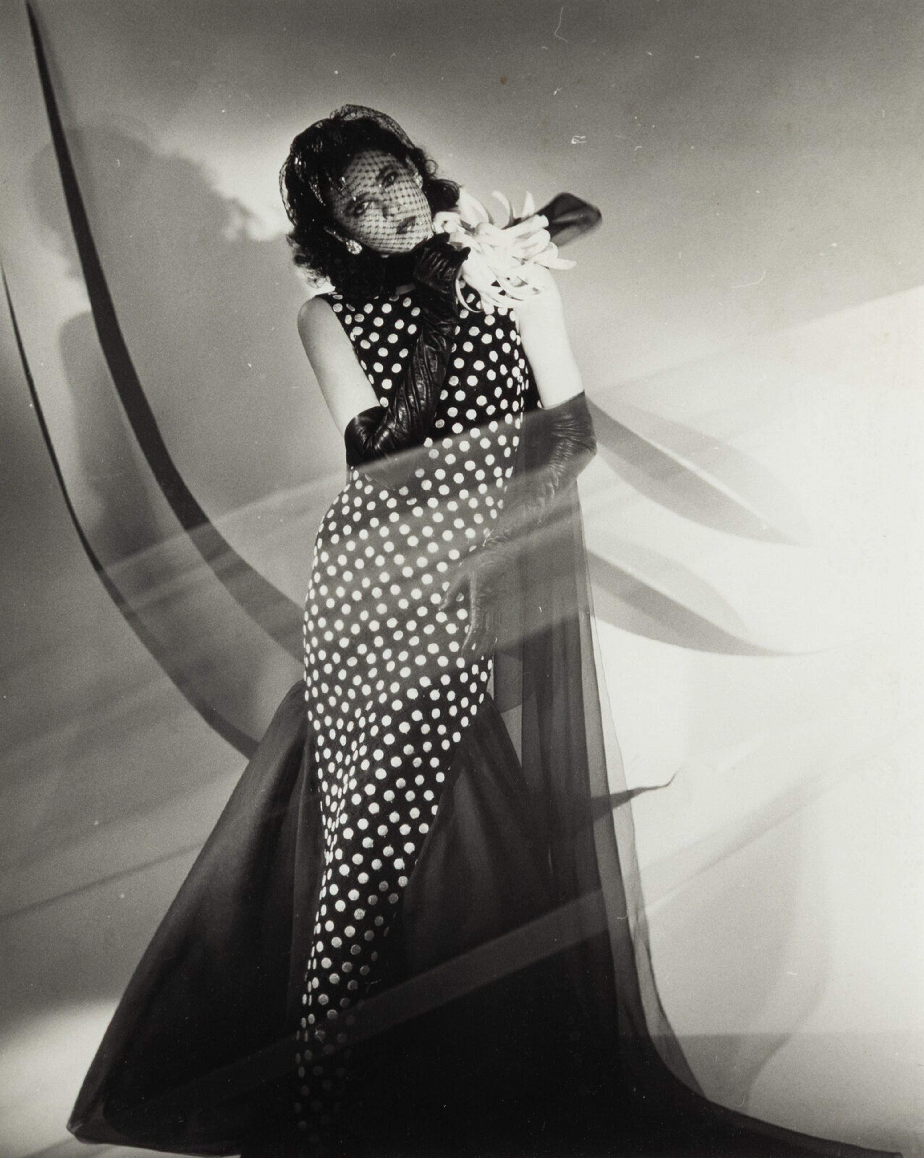 Four photographs depicting Dayle Haddon