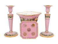 A Pair of Paris Porcelain Pink-Ground Vine-Decorated Candlesticks and a Jardinière