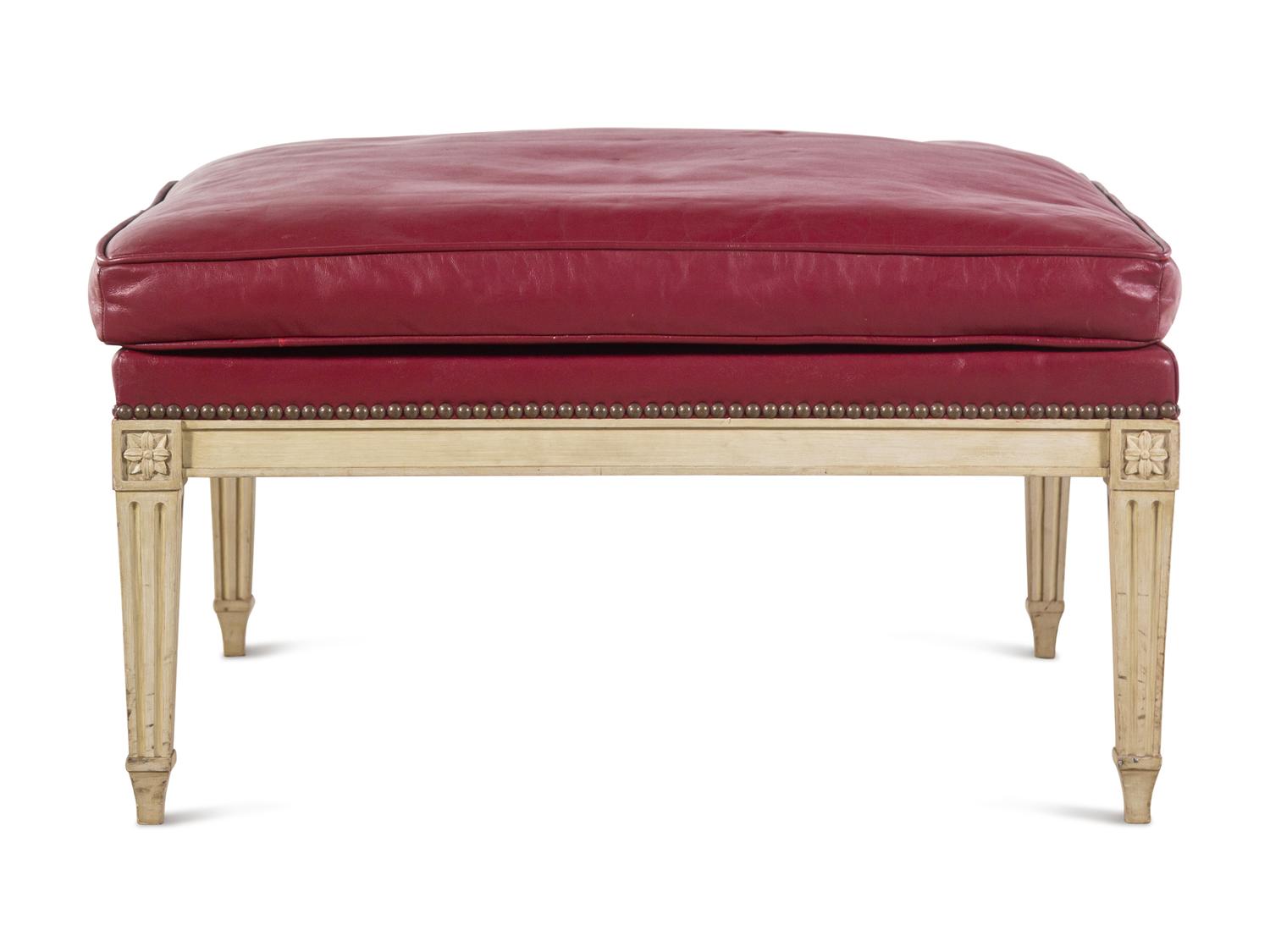 A Louis XVI Style Painted and Leather-Upholstered Ottoman