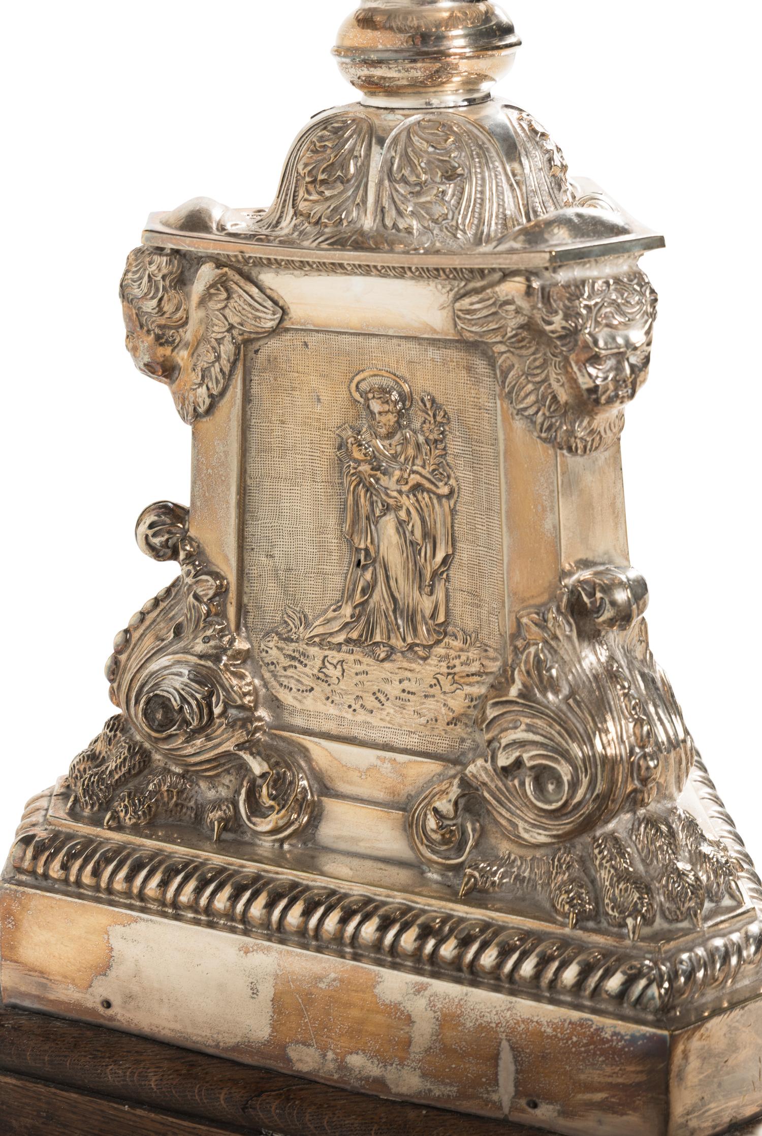 A Pair of Monumental Silvered Metal Altar Sticks