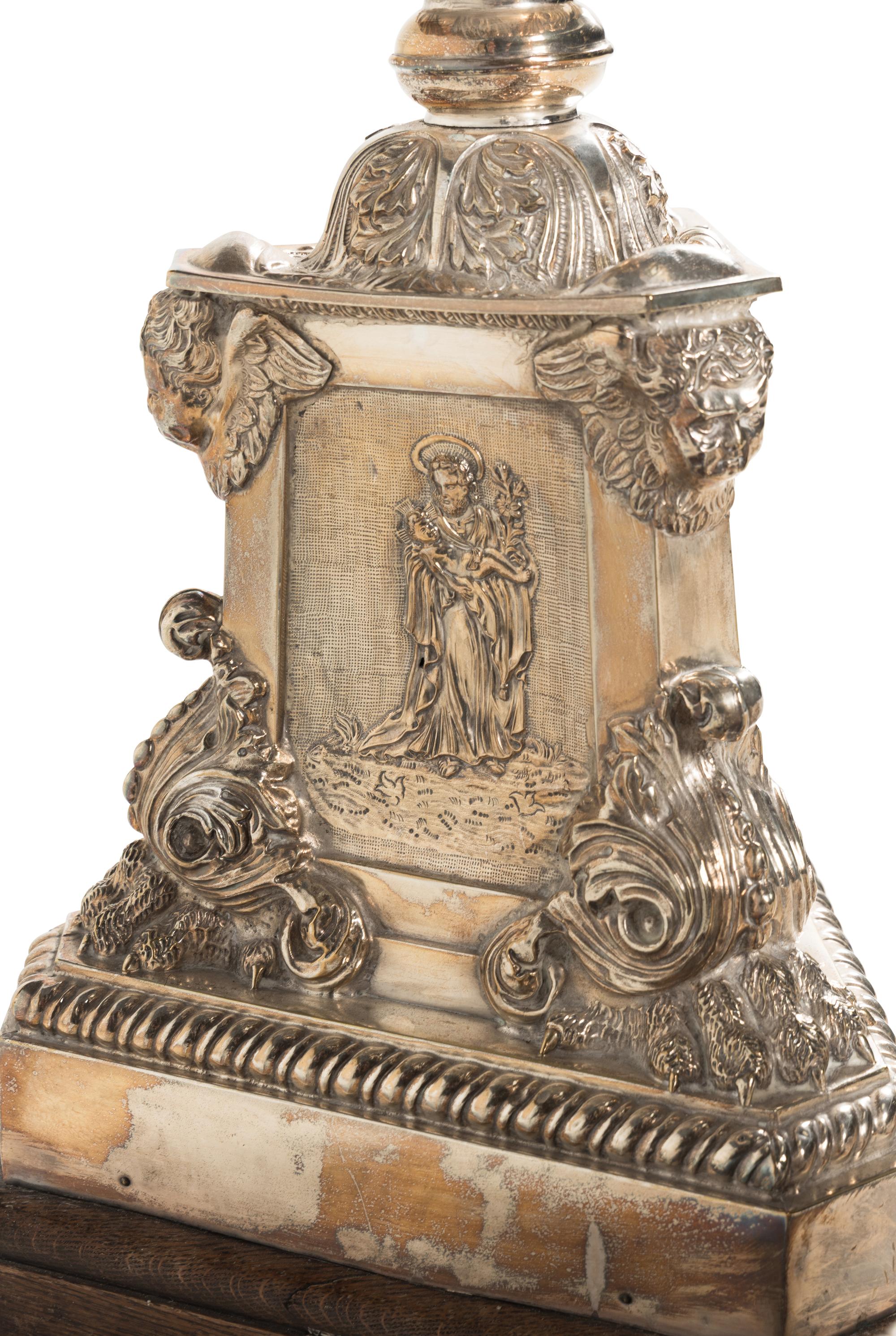 A Pair of Monumental Silvered Metal Altar Sticks