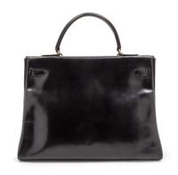 An Hermes 35cm Black Leather Kelly Bag, 13 1/2 x 9 1/2 x 5 inches.