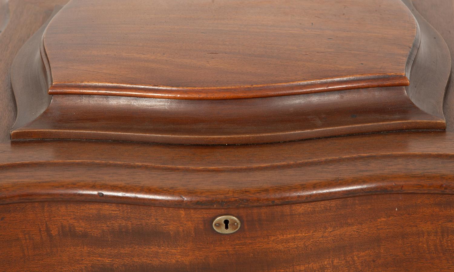 A Regina Mahogany Serpentine Cabinet Music Box