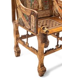 An Egyptian Style Painted Giltwood and Mother-of-Pearl Inlaid Throne Chair