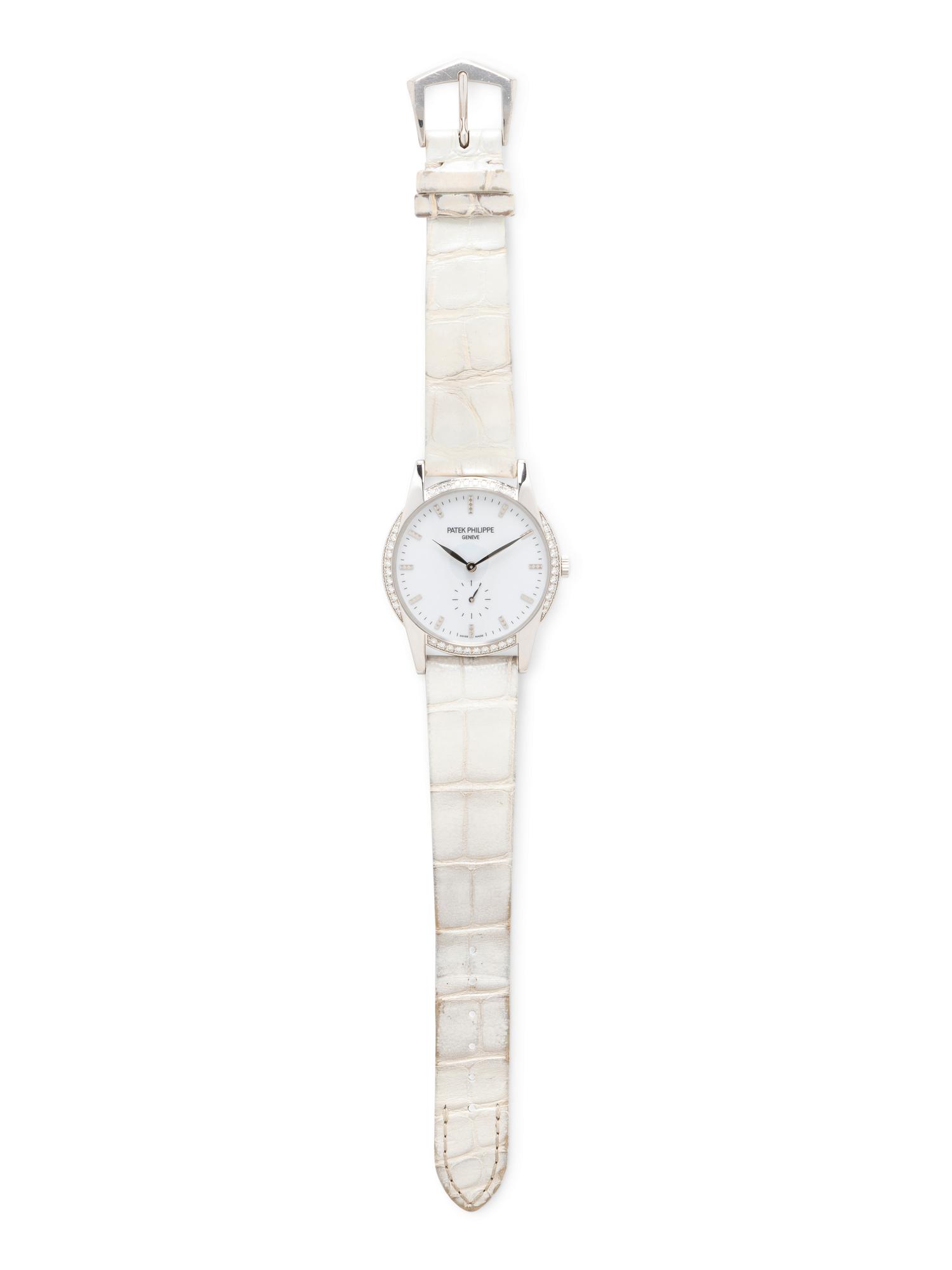 PATEK PHILIPPE, REF. 7122/200G-011 18K WHITE GOLD AND DIAMOND 'TIMELESS WHITE' 'CALATRAVA' WATCH, WITH CERTIFICATE OF ORIGIN