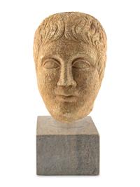 A Roman Stone Head of a Man