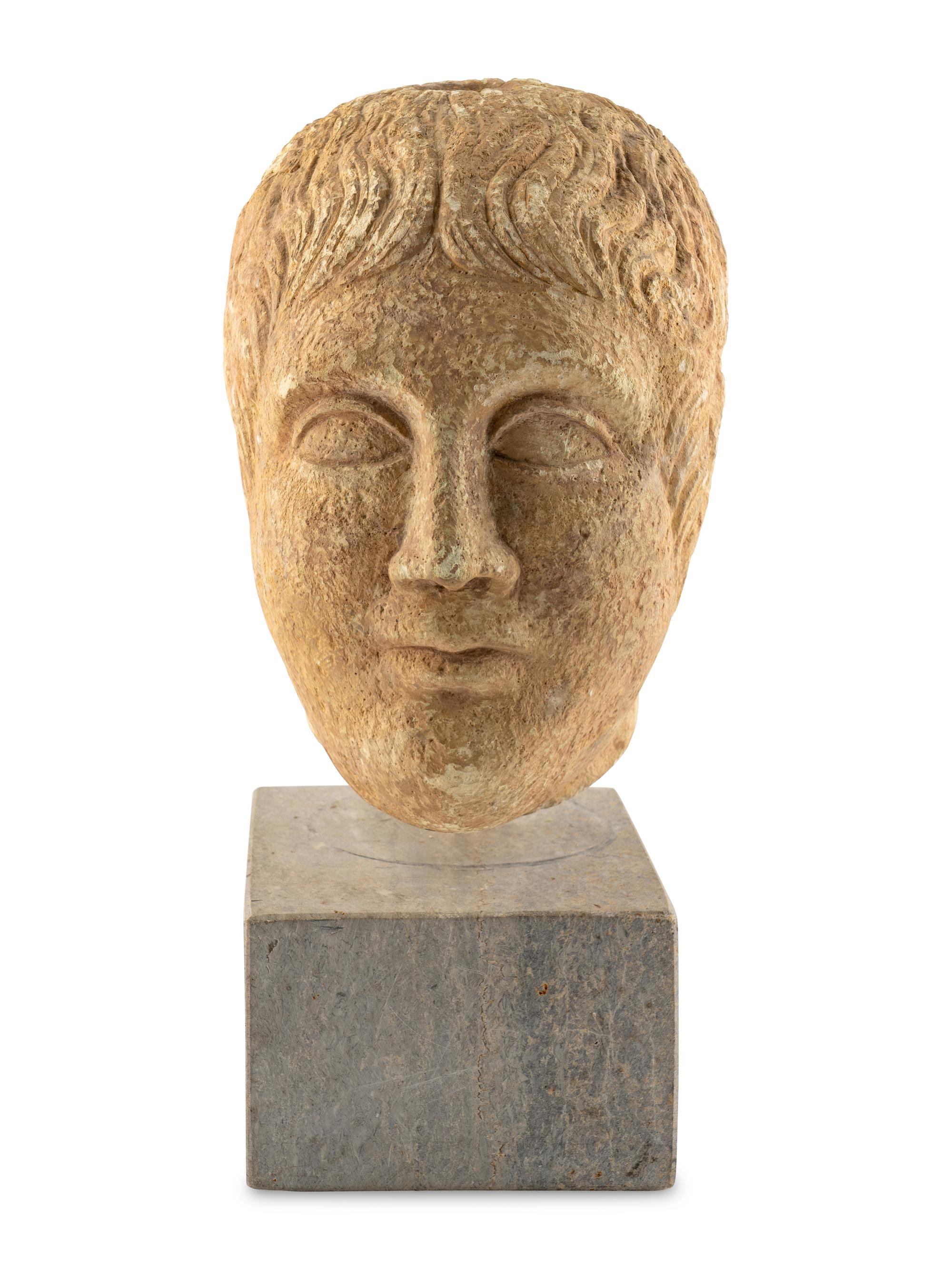 A Roman Stone Head of a Man