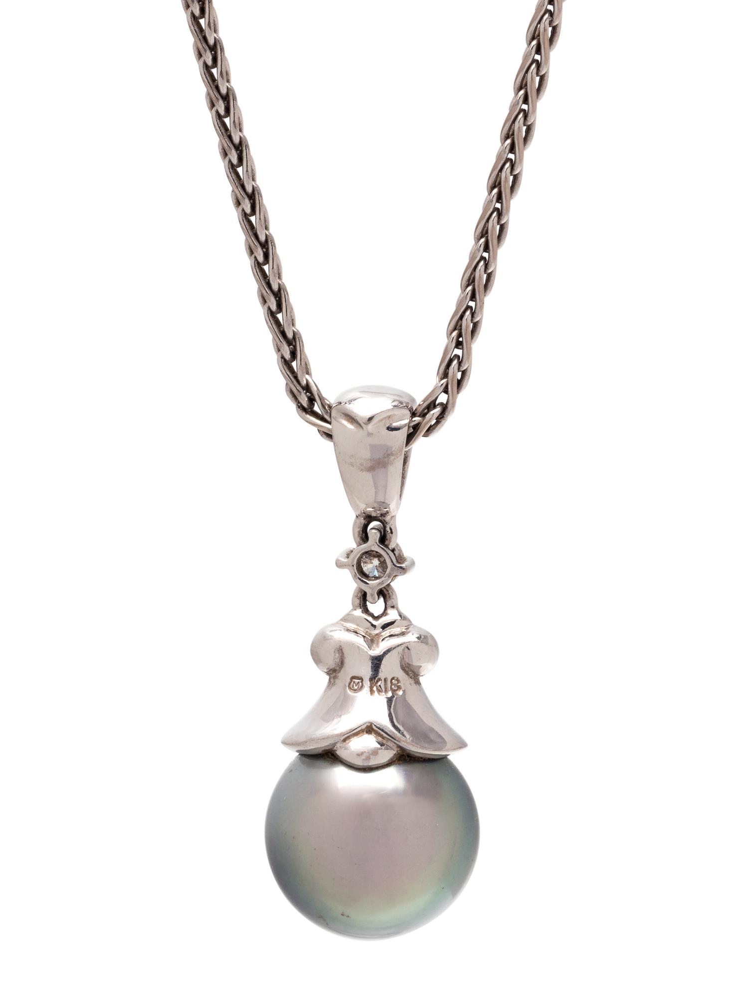 MIKIMOTO, CULTURED TAHITIAN PEARL AND DIAMOND PENDANT