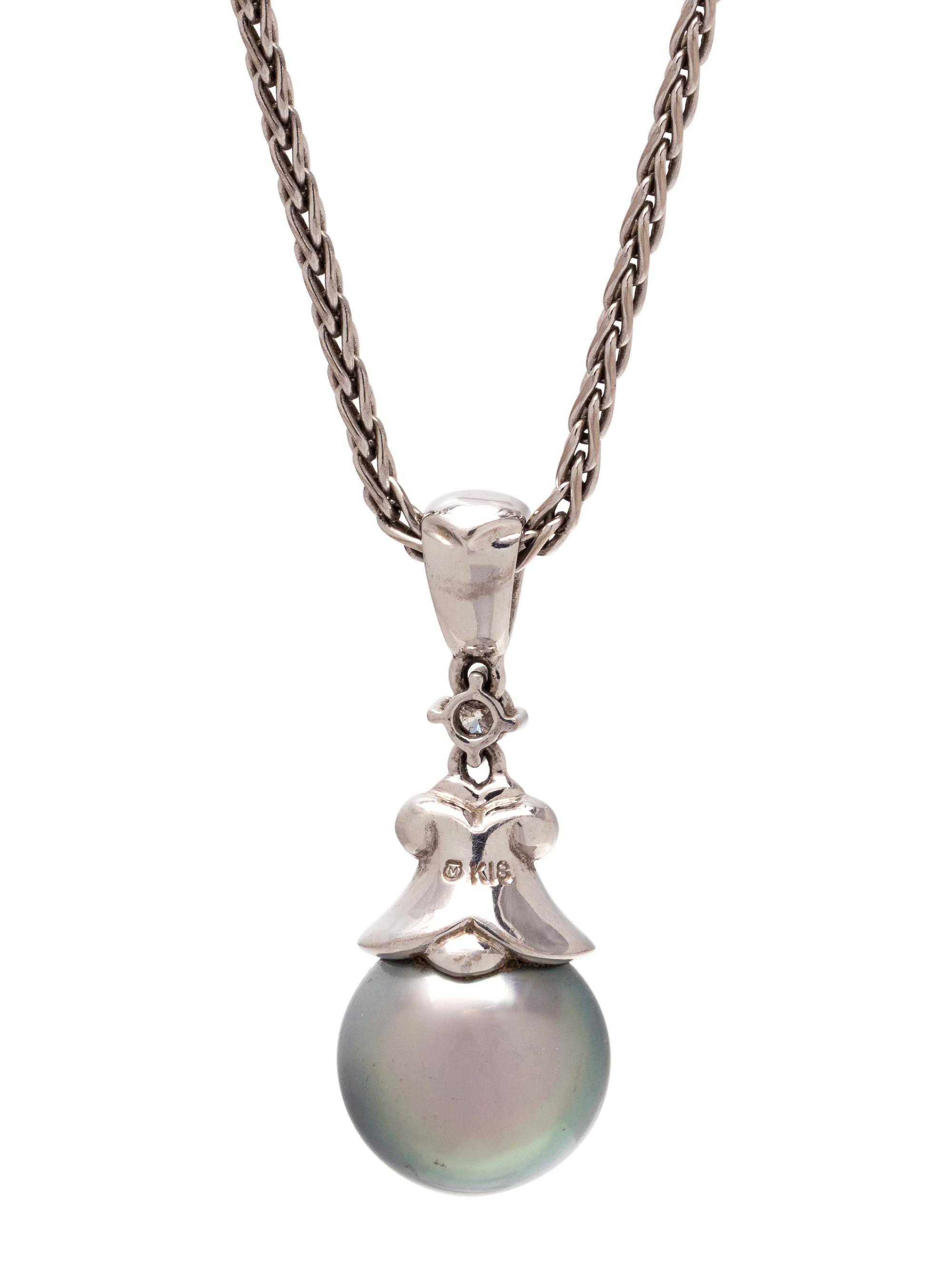 MIKIMOTO, CULTURED TAHITIAN PEARL AND DIAMOND PENDANT