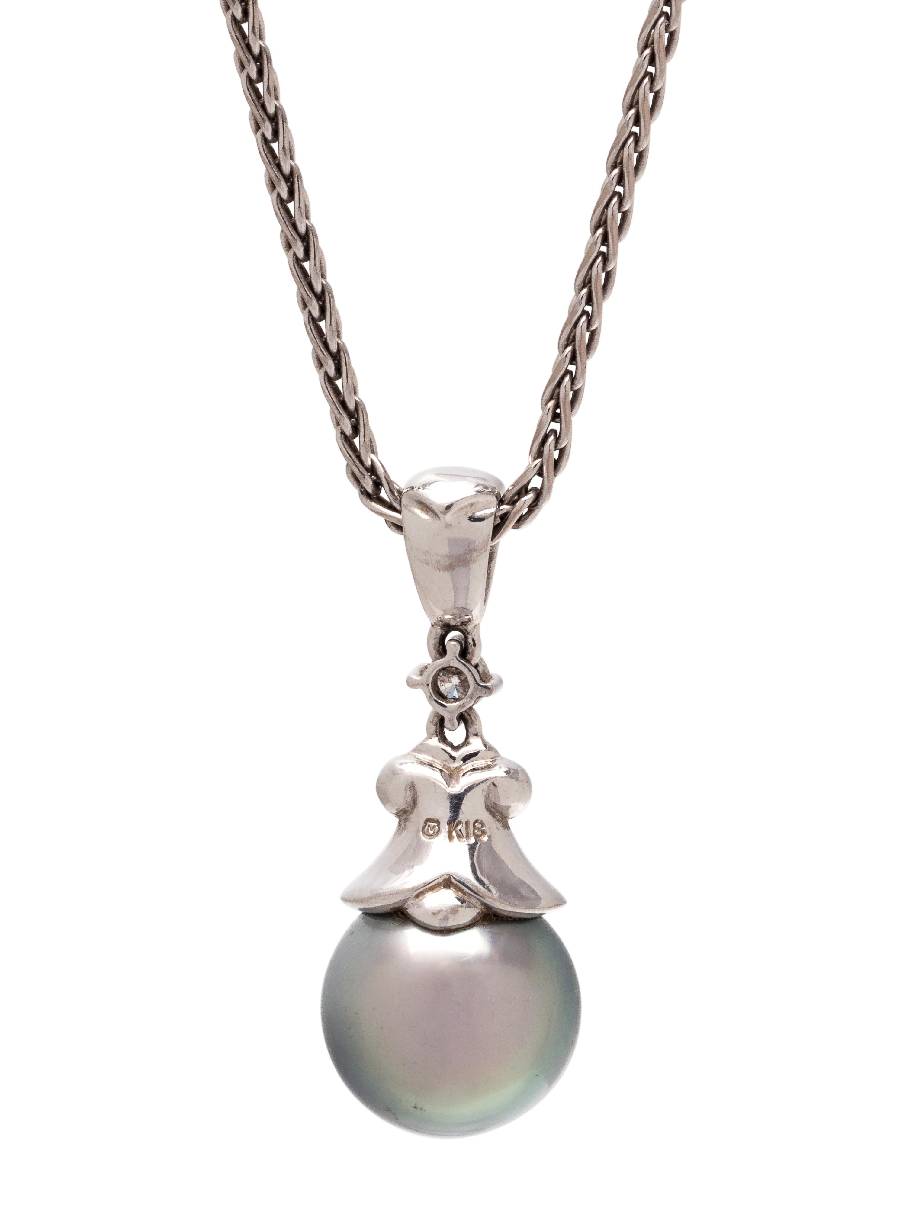 MIKIMOTO, CULTURED TAHITIAN PEARL AND DIAMOND PENDANT