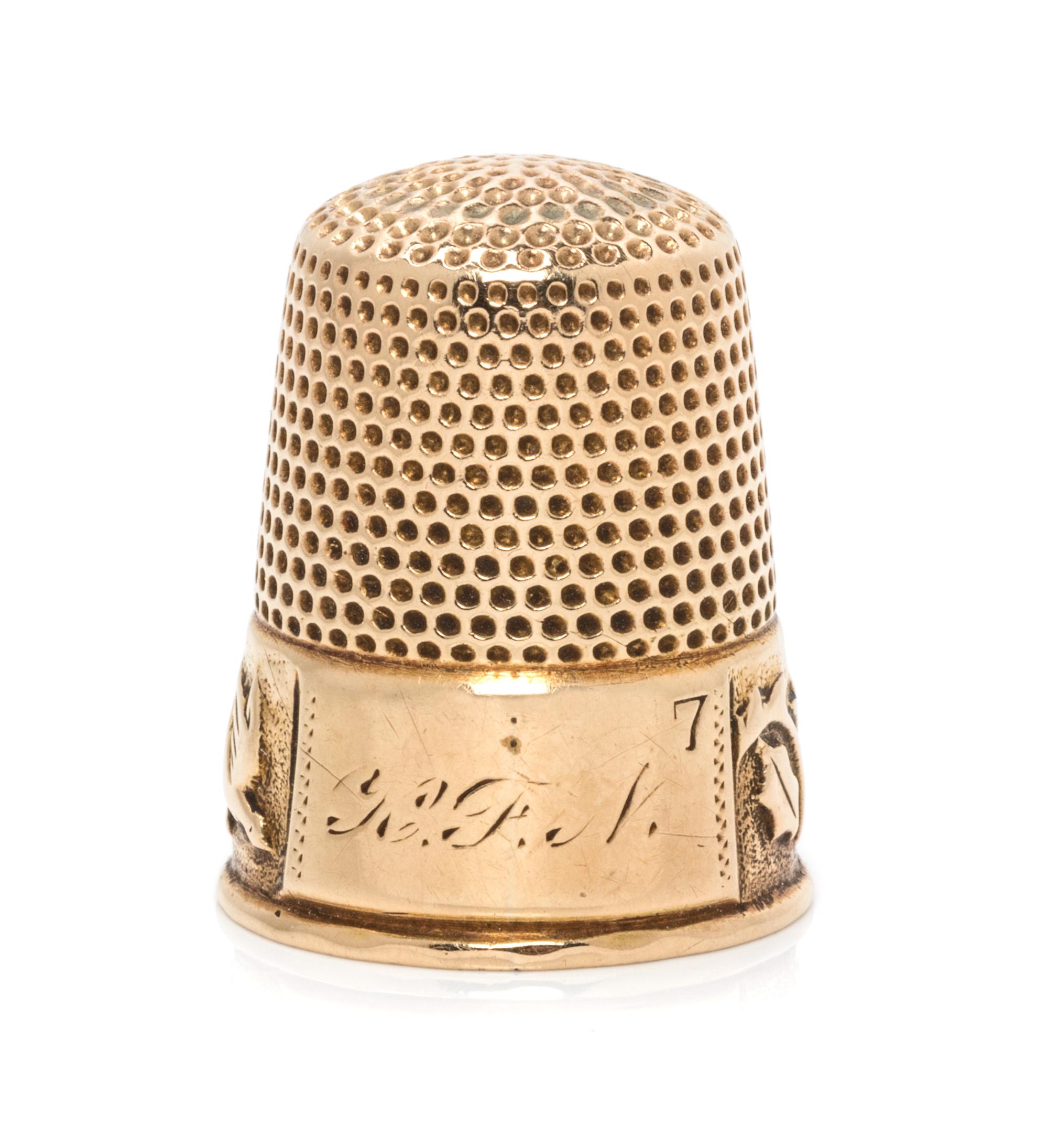 An American 14-Karat Yellow Gold Thimble, Ketcham & McDougall, New York, NY, 19th Century, the knurled top and body above a foliate, vi