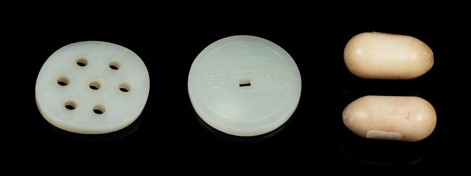 Four Chinese Jade Carvings Diameter of largest 2 inches. — QING DYNASTY (1644-1911)