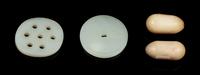 Four Chinese Jade Carvings Diameter of largest 2 inches. — QING DYNASTY (1644-1911)