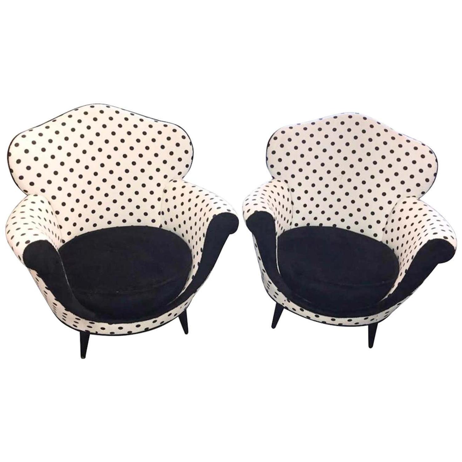 A Pair of Black And White Upholstered Armchairs