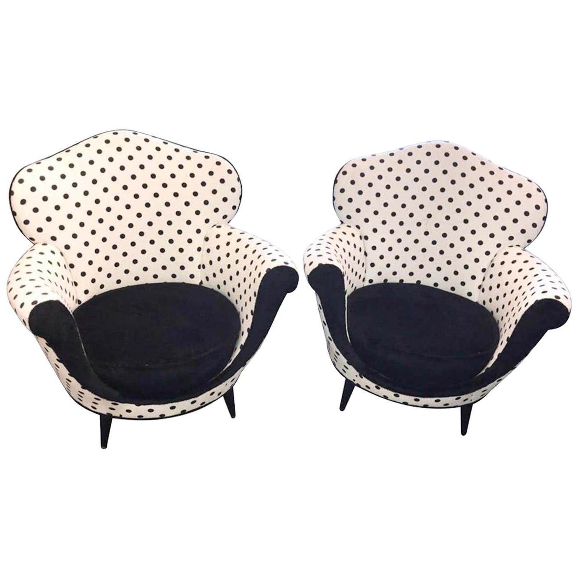 A Pair of Black And White Upholstered Armchairs