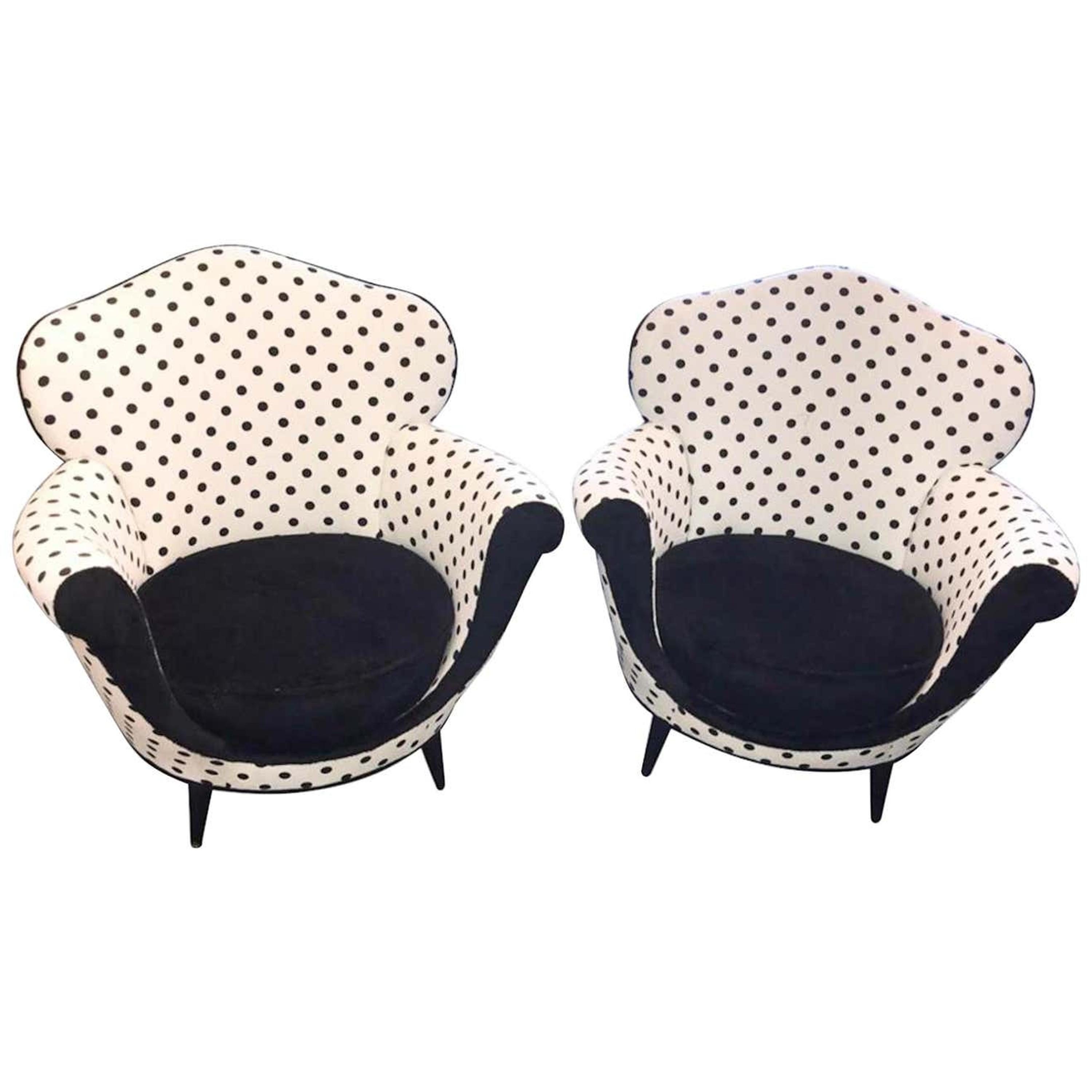 A Pair of Black And White Upholstered Armchairs