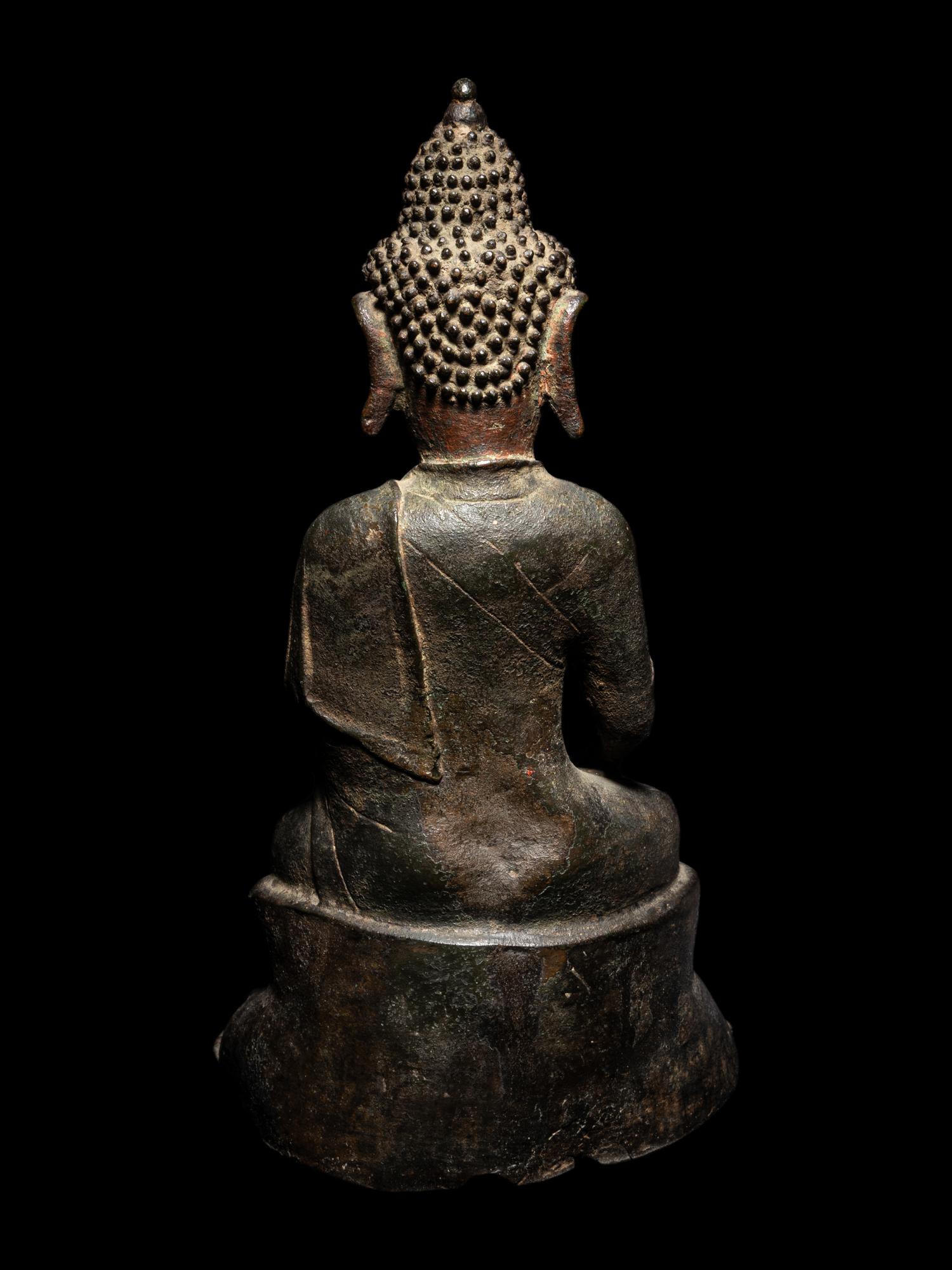 A Bronze Figure of Seated Buddha